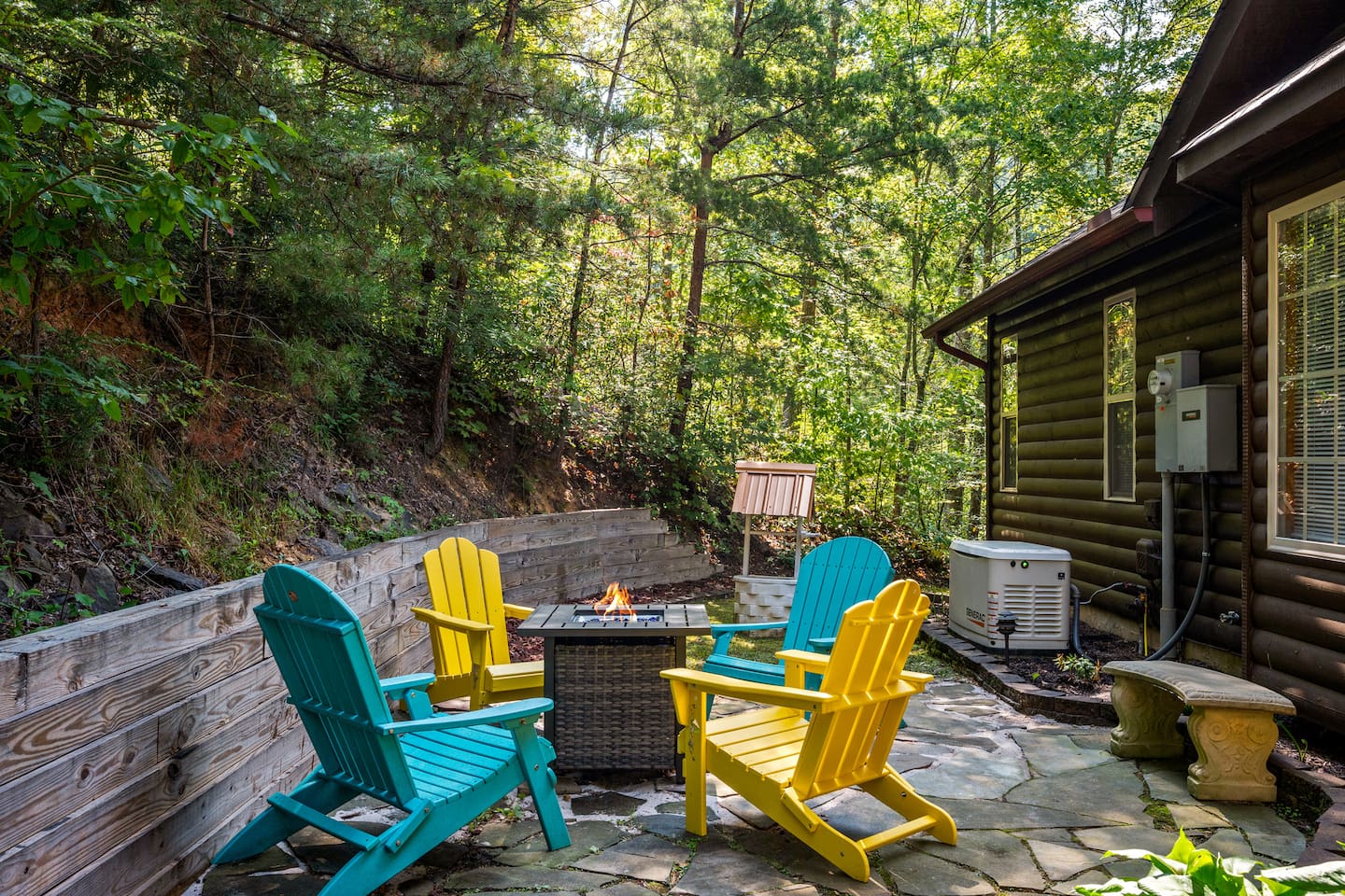 Enjoy the warmth of the firepit while sitting back in the Adirondack chairs