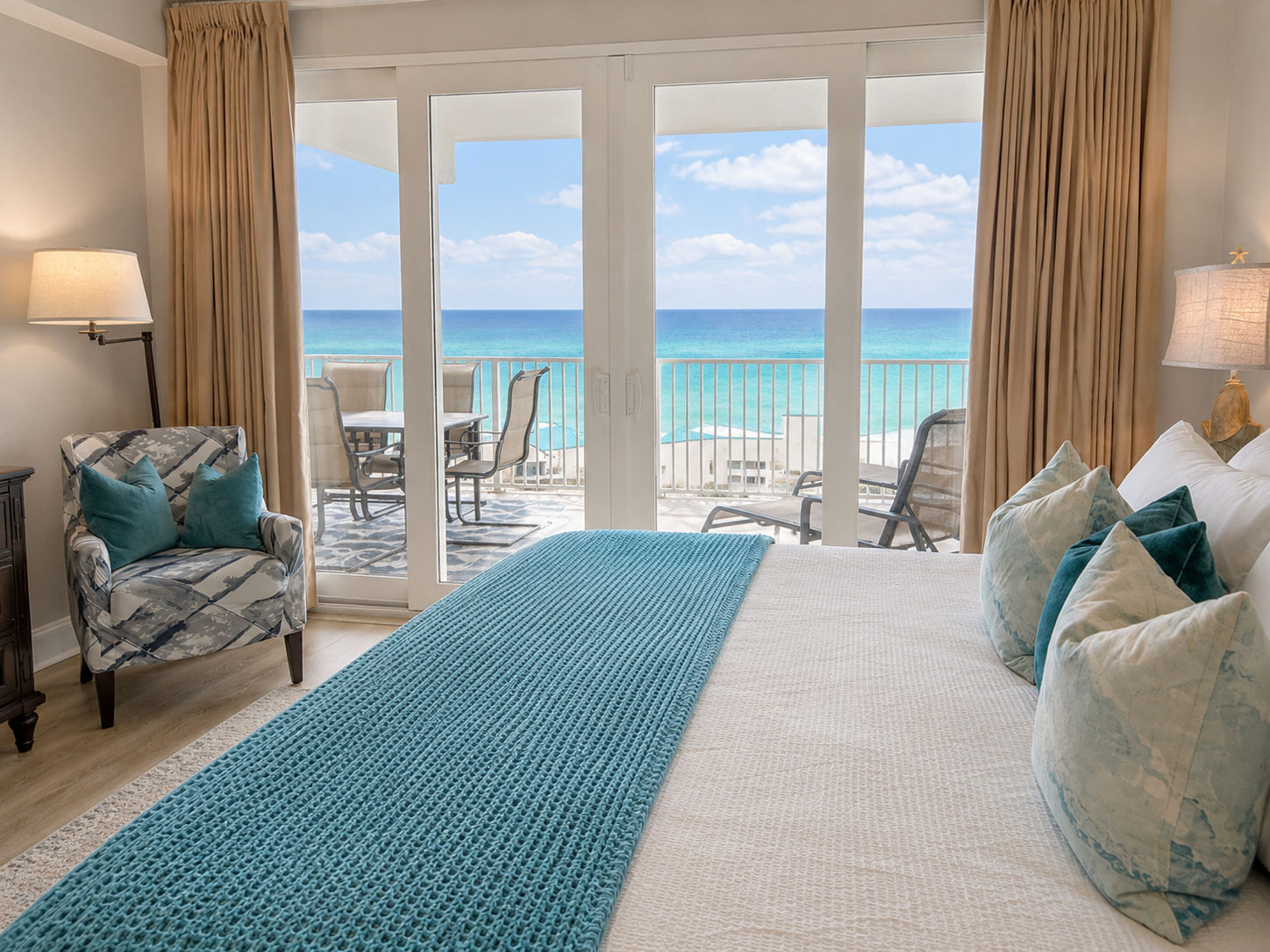 Master bedroom with balcony access and ocean views