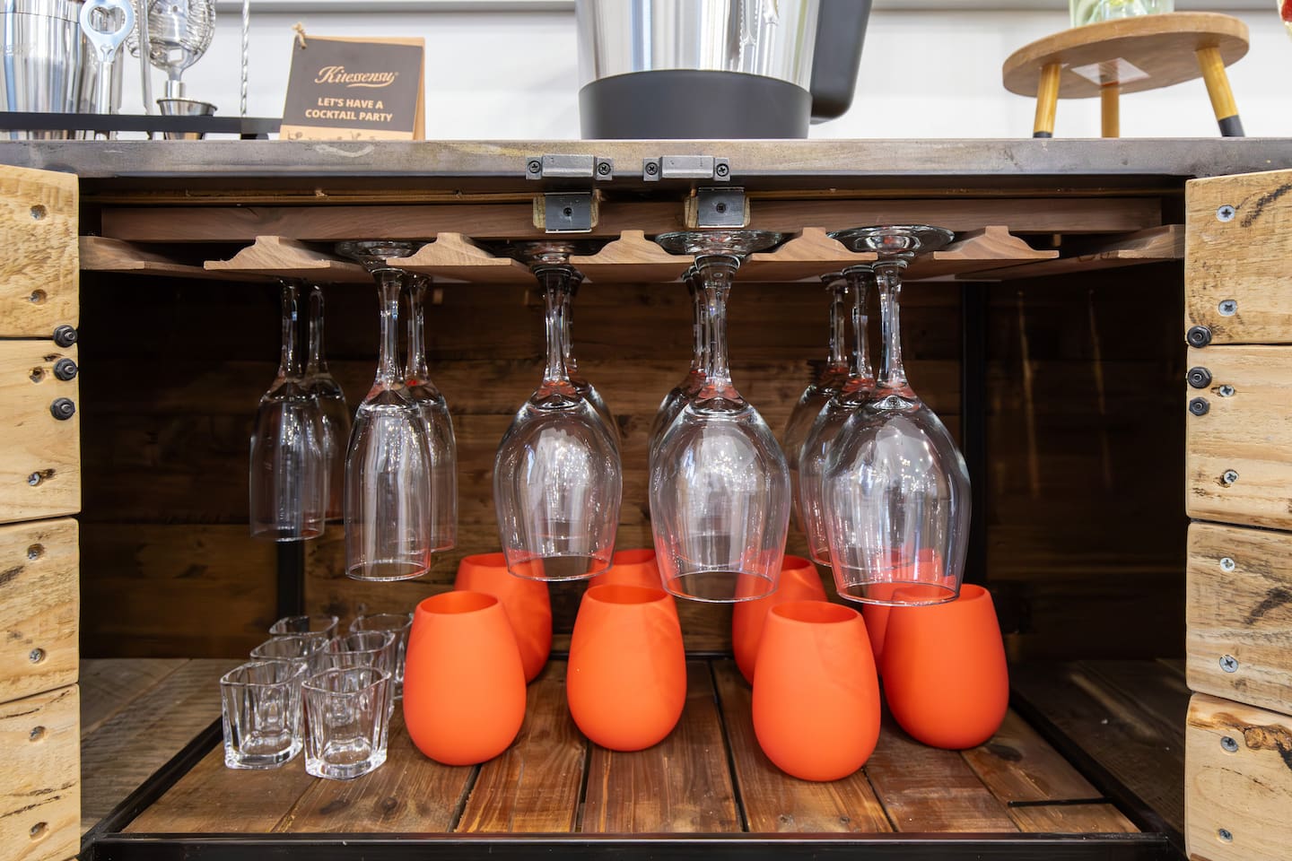 Our bespoke bar cabinet invites you to unwind with a glass of your favorite wine, served from a collection that's as curated as your tastes. We have silicone "glasses" for you to enjoy your favorite beverage by the pool!