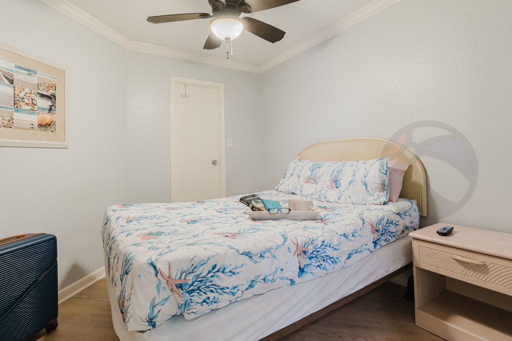 Just to your right you'll find the cozy bedroom with closet and queen bed