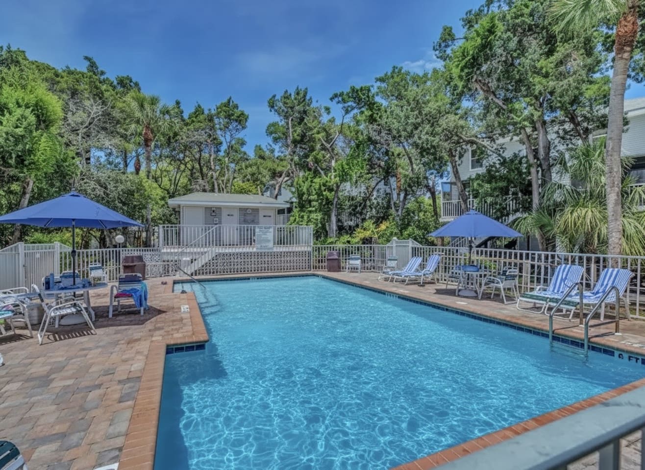 Enjoy the best of island living with access to our seasonally heated pool, just steps from our home. Shared with the other homes in the peaceful complex, the inviting pool is a wonderful spot to cool off and soak up some sun! 