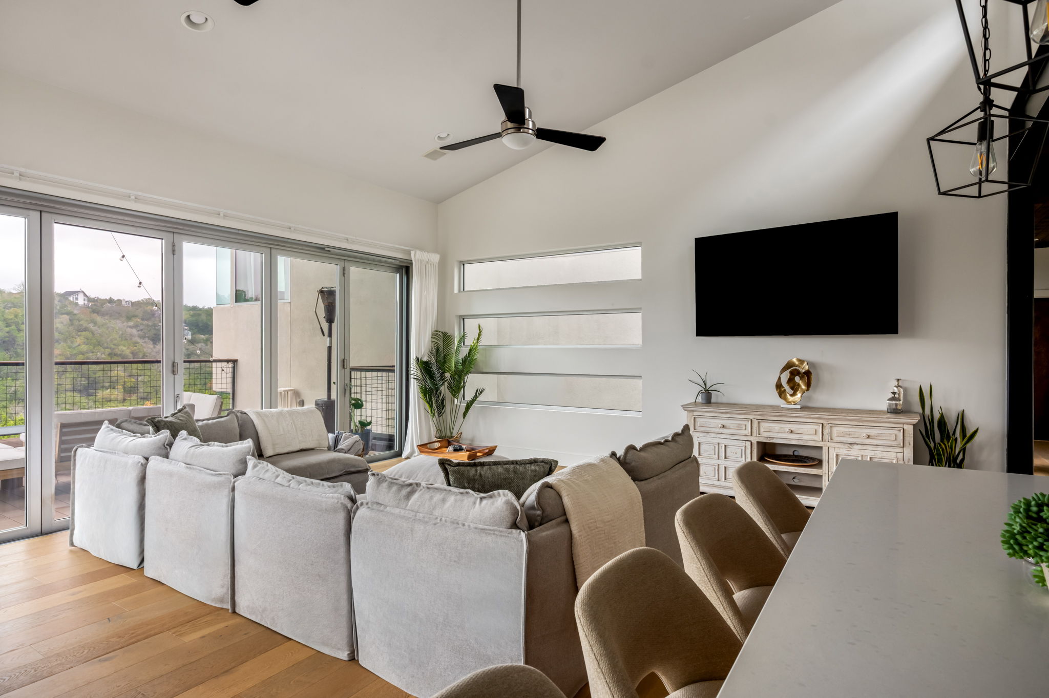 Relax and unwind in this spacious living room with comfy seating and a smart TV