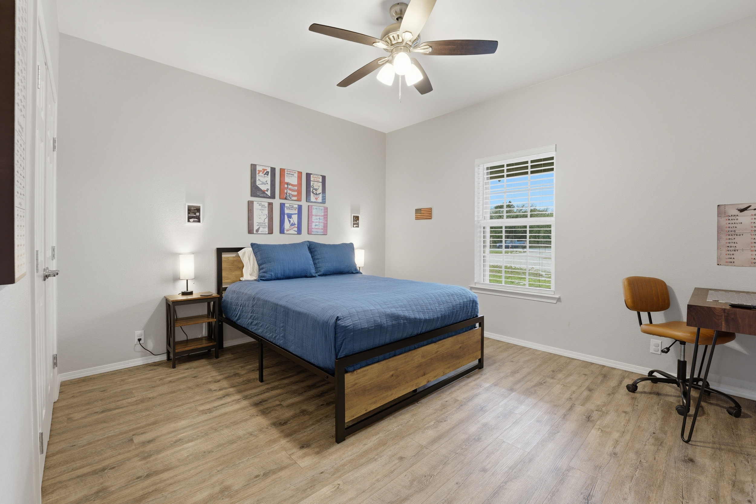 Another queen room with desk designed for a restful, comfortable stay