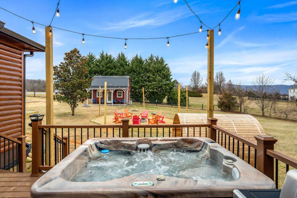 Step outside and melt into the moment private hot tub and soft lights for the perfect night in.