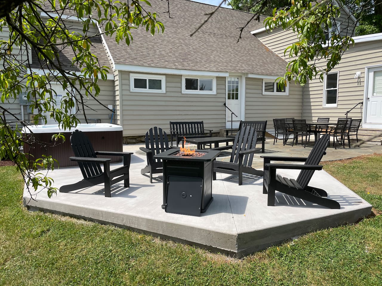 The back patio with large backyard is perfect for your group