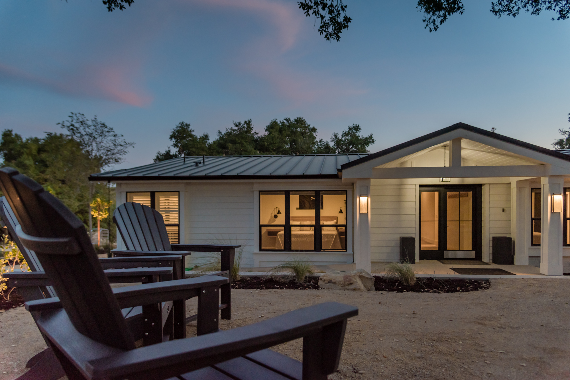 Unwind under the soft evening glow, where starlit skies create a serene, luxury retreat.