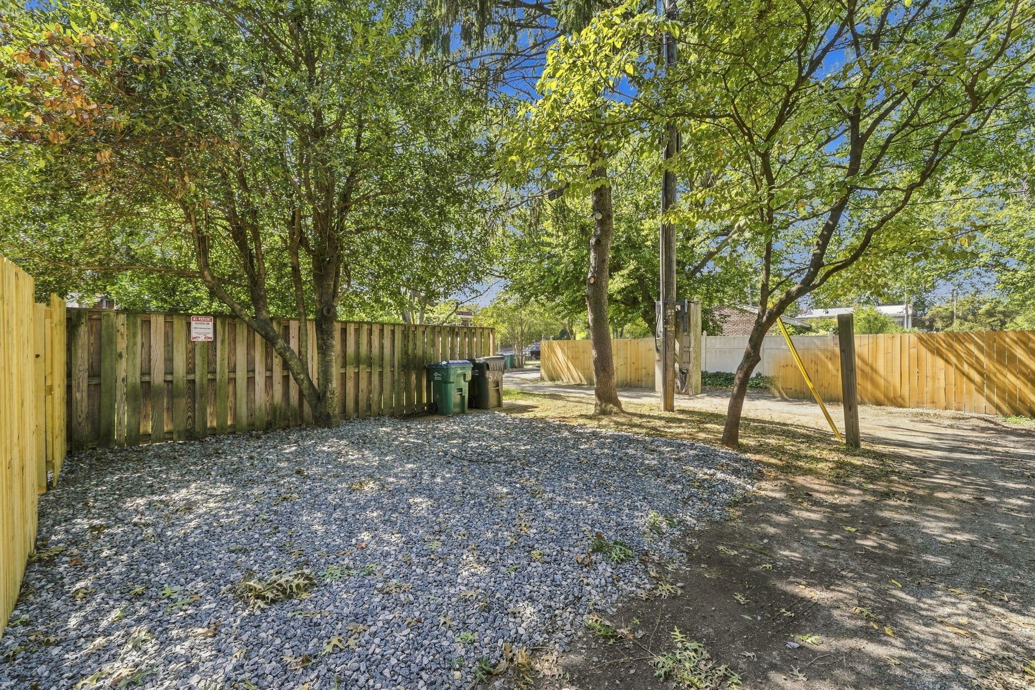 Outdoor Space: Enjoy your private gravel retreat surrounded by lush greenery in Richmond!
