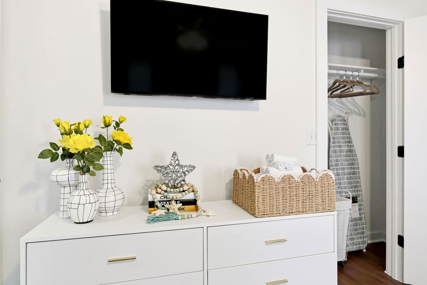 Cozy second-level bedroom with two bunk beds, each with blankets and a Roku TV. First room you see at the top of the stairs. Includes 4 full-body towels, 4 washcloths, and 2 hand towels for your stay.