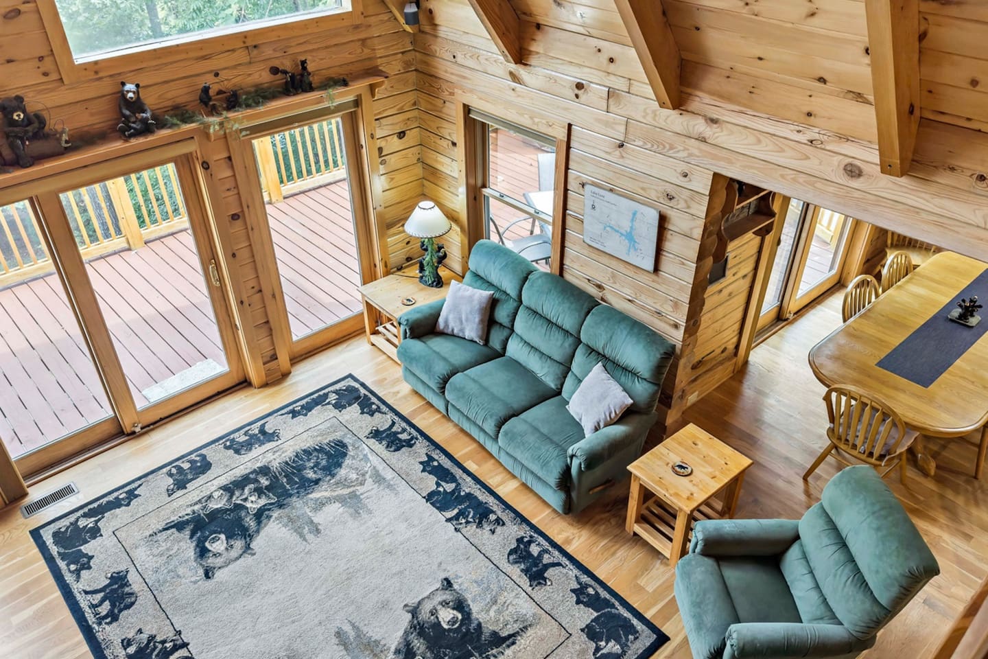 From the upper level of the cabin looking down to the main level of the cabin. Leading to the 2 bedrooms upstairs