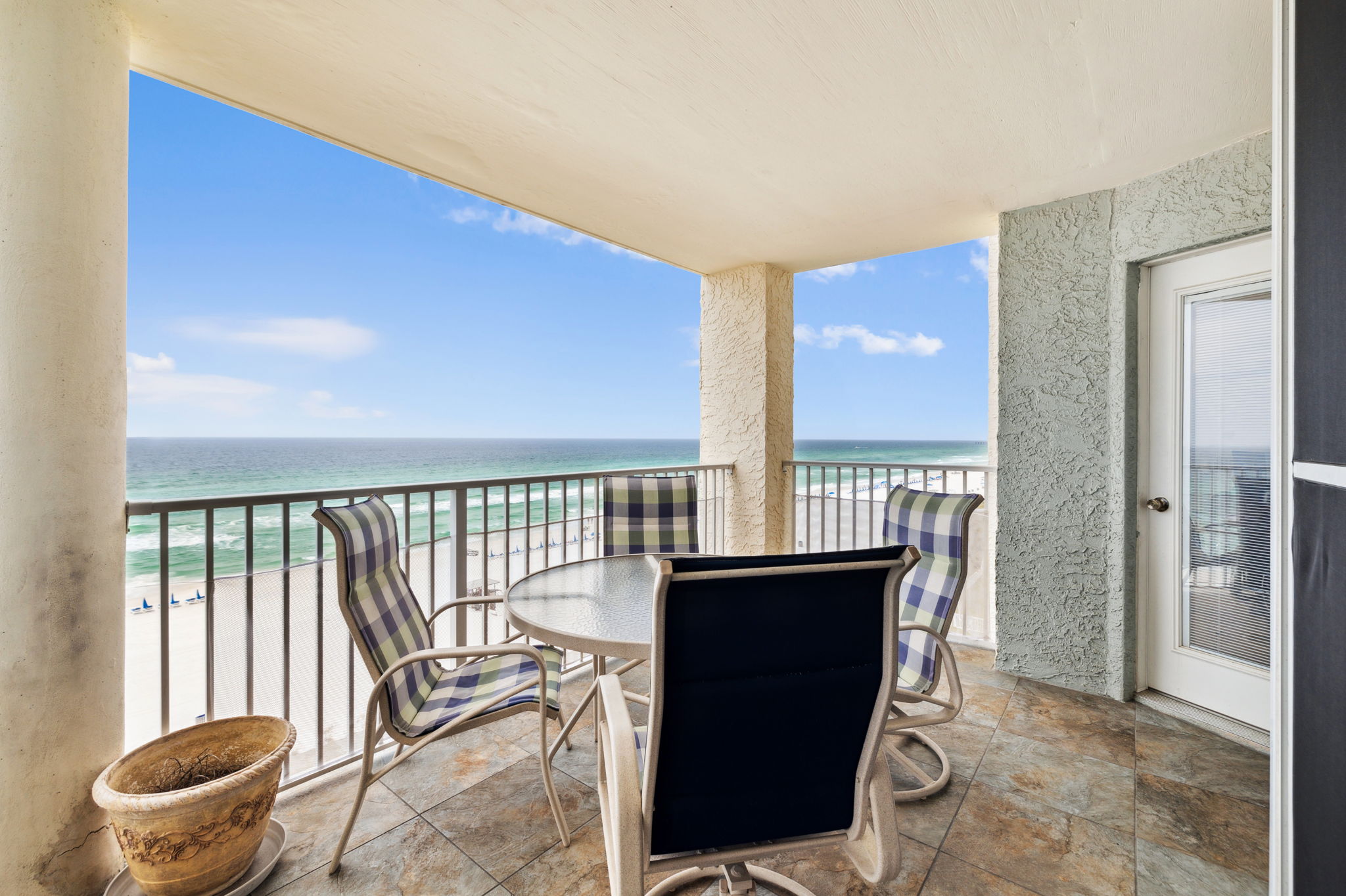 Dine al fresco on the beautiful balcony overlooking the Gulf