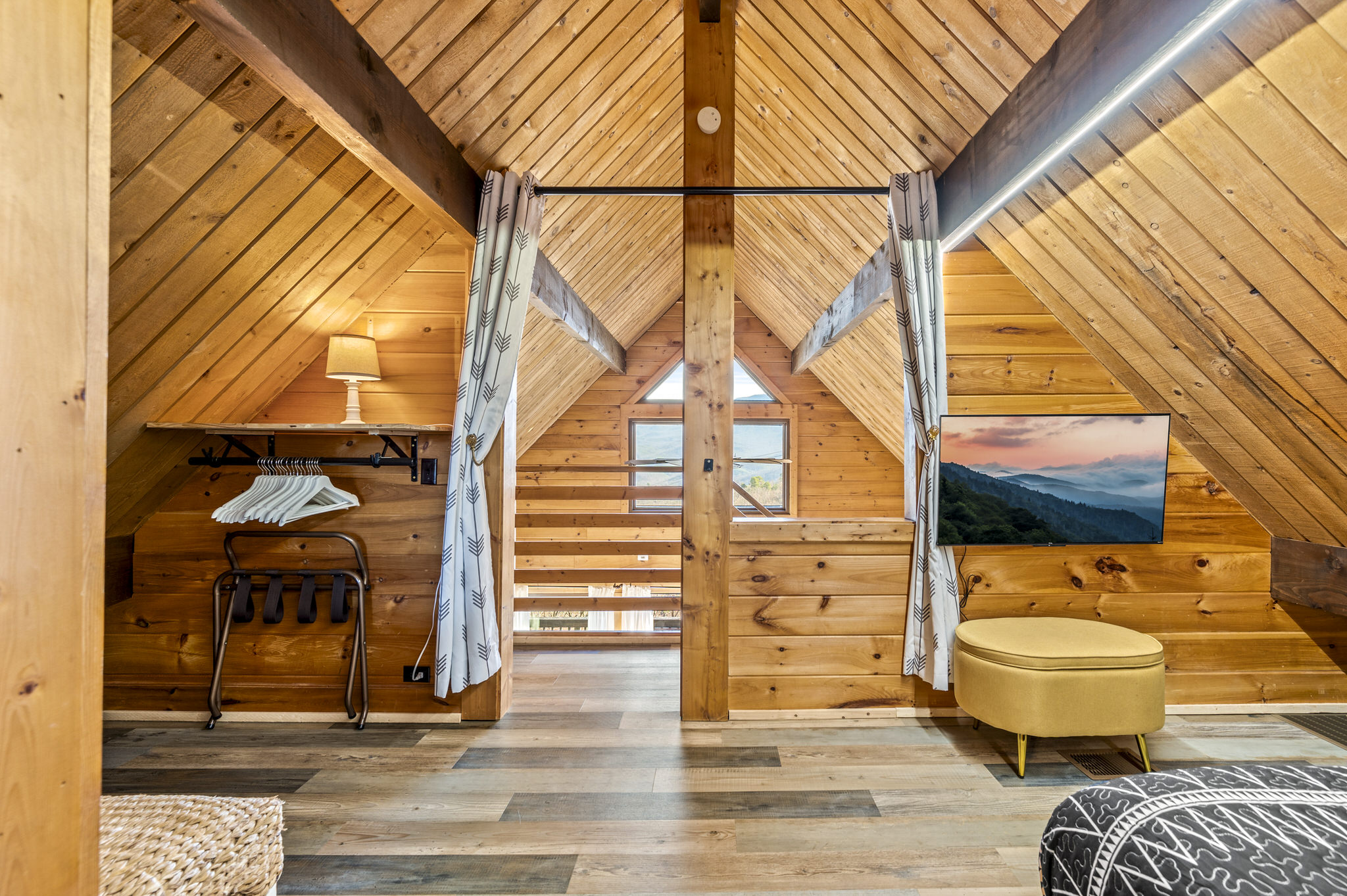 It may not have doors, but who would want to miss out on this view? Curtains have been tastefully updated to be longer with sun blocking function making the room more private when needed! Very similar but not yet pictured.