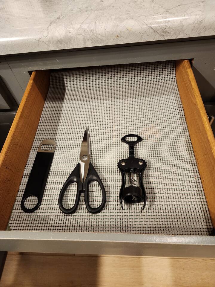 Bottle opener, scissors, and a wine bottle opener. 