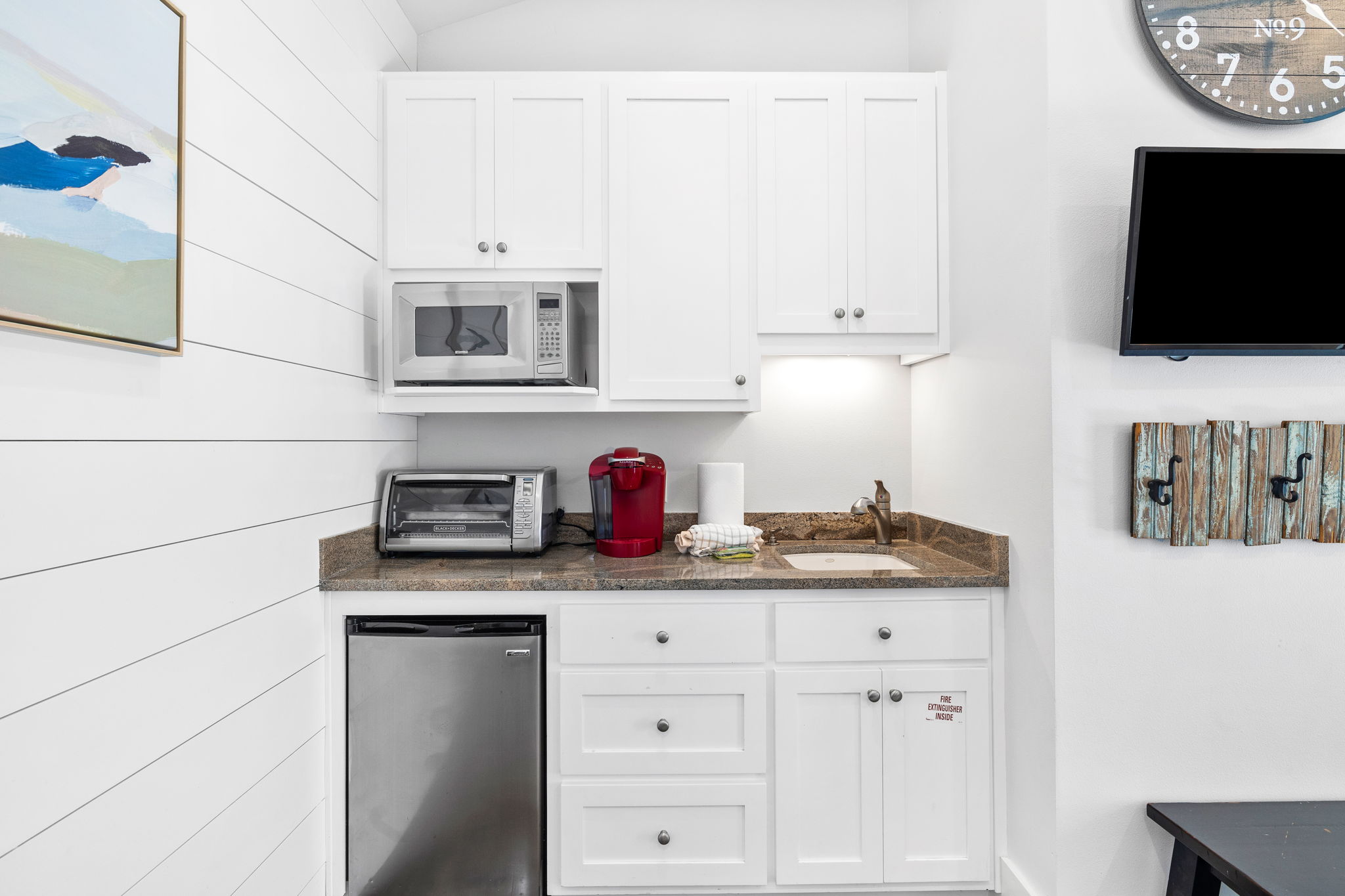 Convenient kitchenette - perfect for quick breakfasts, snacks, and morning coffee before heading to the beach.