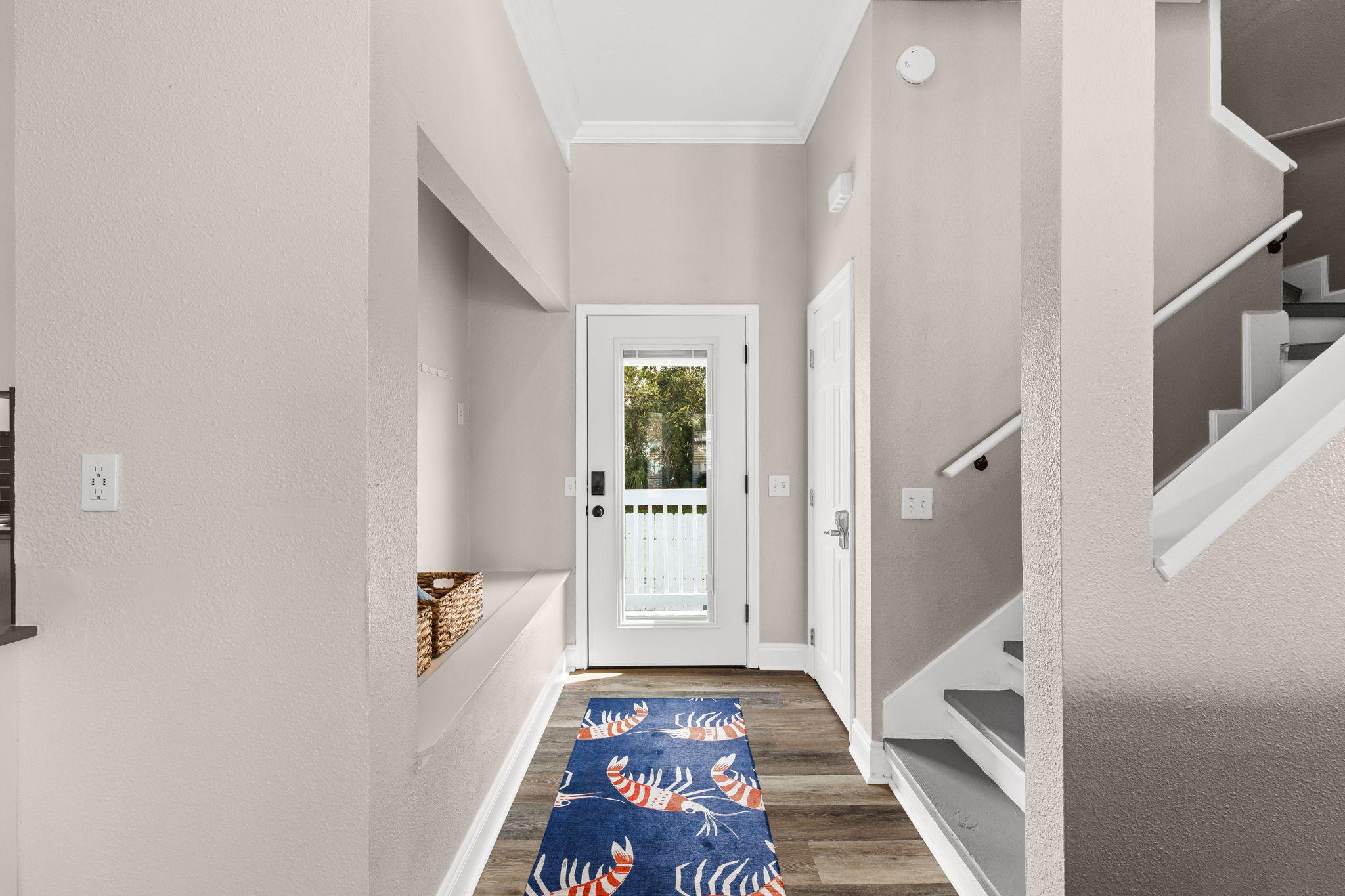 Two bedrooms are located upstairs.