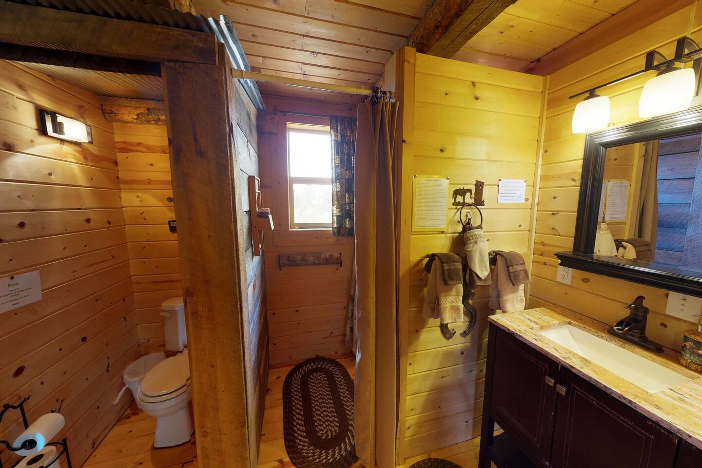 The ranch cabin bathroom is split into 3 sections for maximum privacy.
