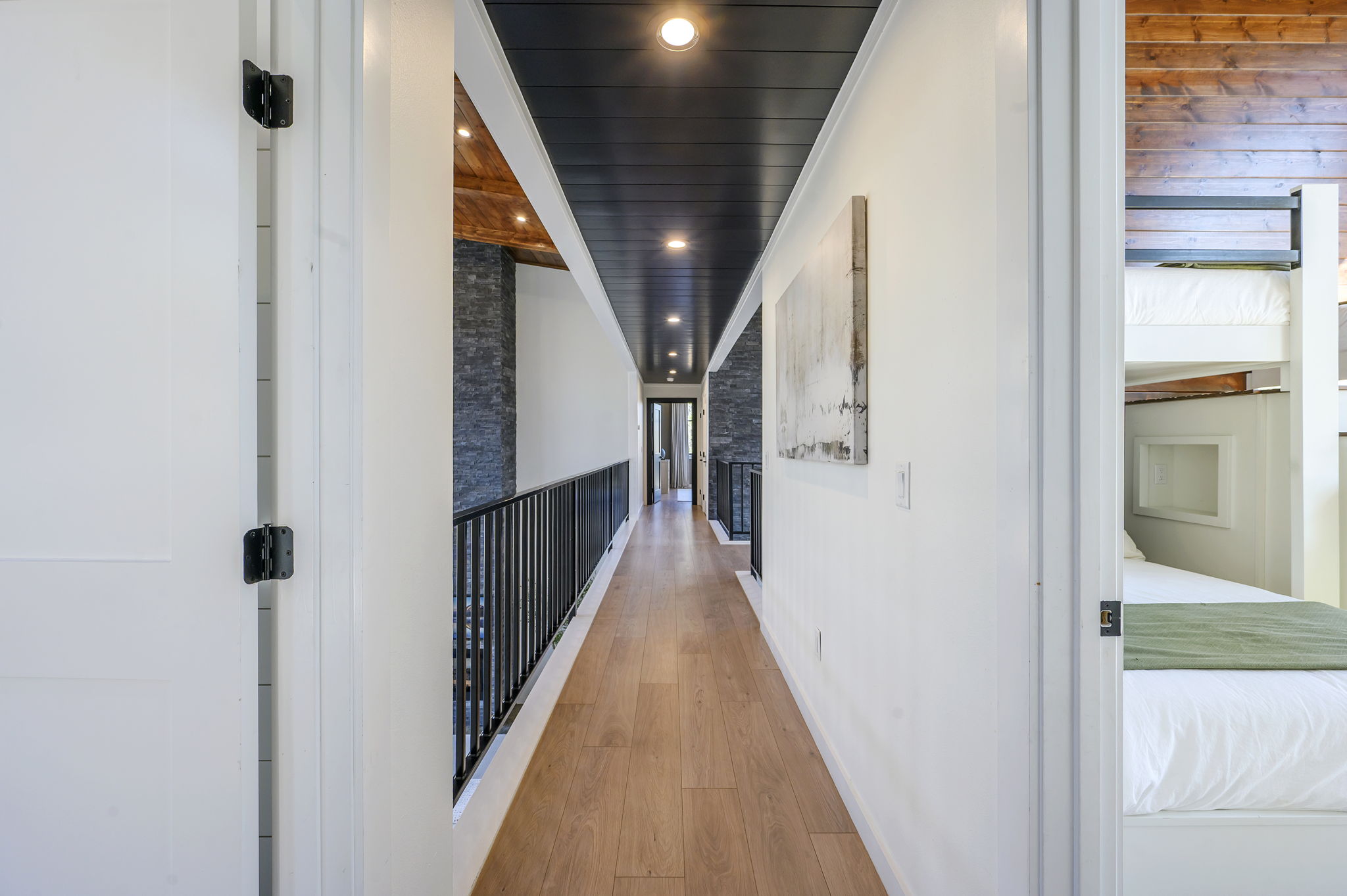 Upstairs 'catwalk' overlooking the main living area.