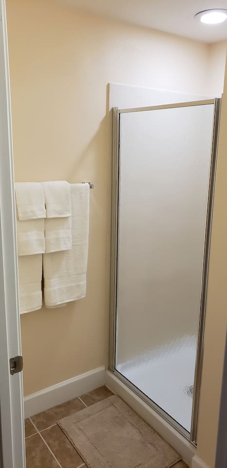 Bathroom next to bunk beds 