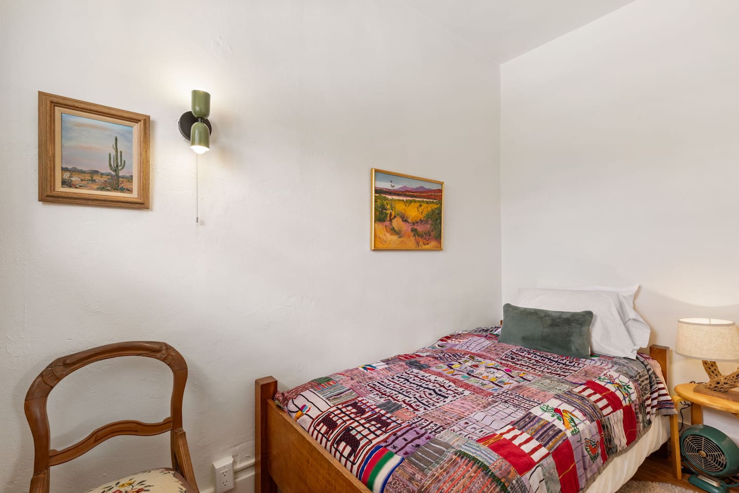 cozy bedroom off dining room. Single bed