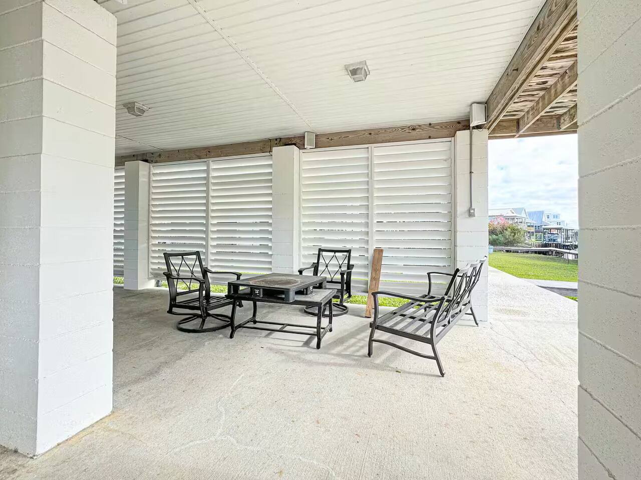 Spacious covered outdoor area with seating and open-air views—perfect for relaxing, gathering, or enjoying the coastal breeze.