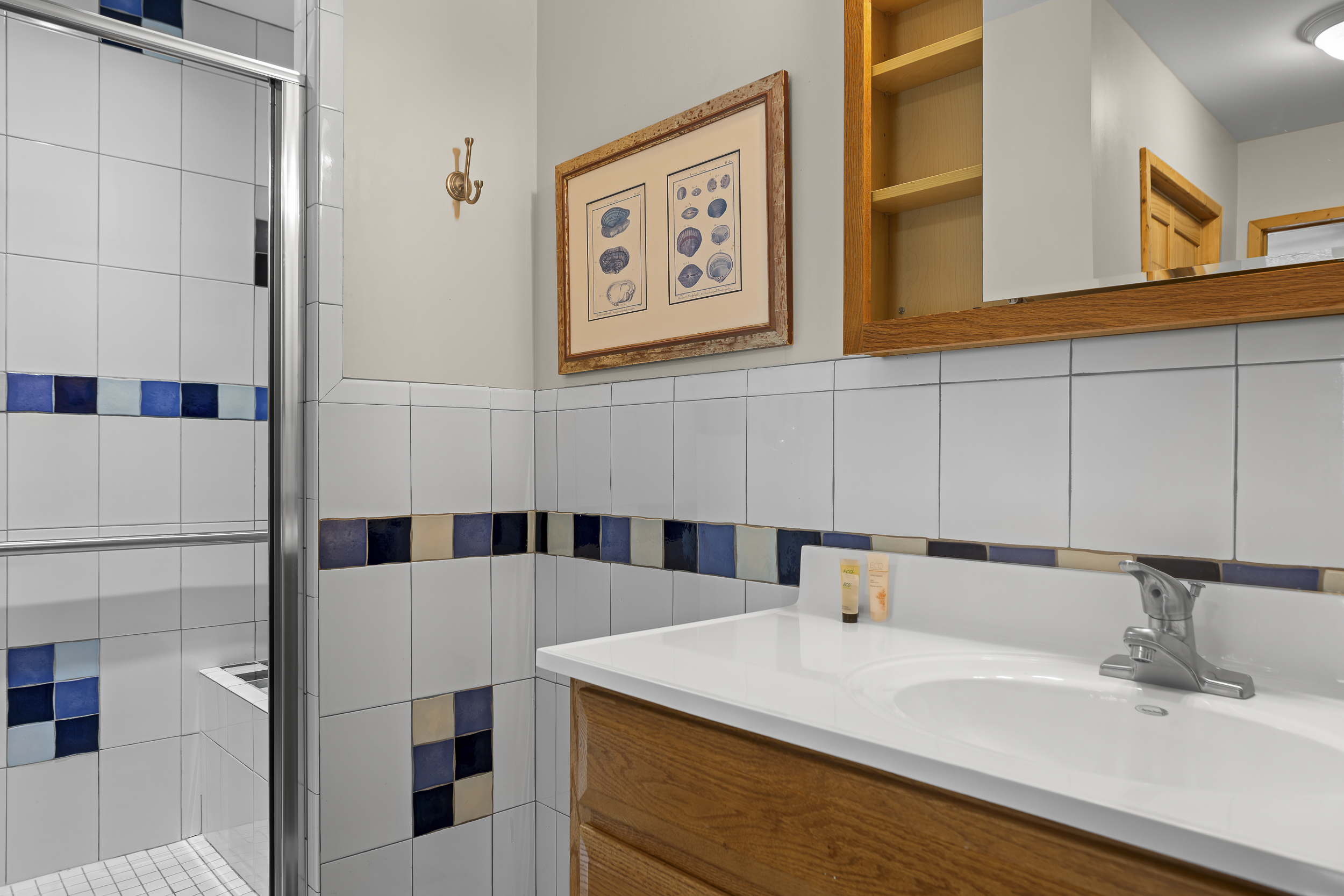 Full Bathroom 2: Enjoy a splash of color and modern amenities in this stylish space!