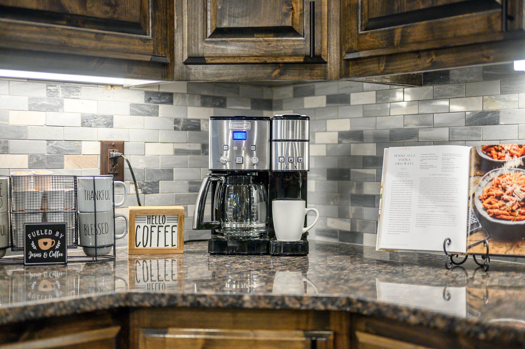 Sleek stone counters and a premium brewer for the perfect morning cup.