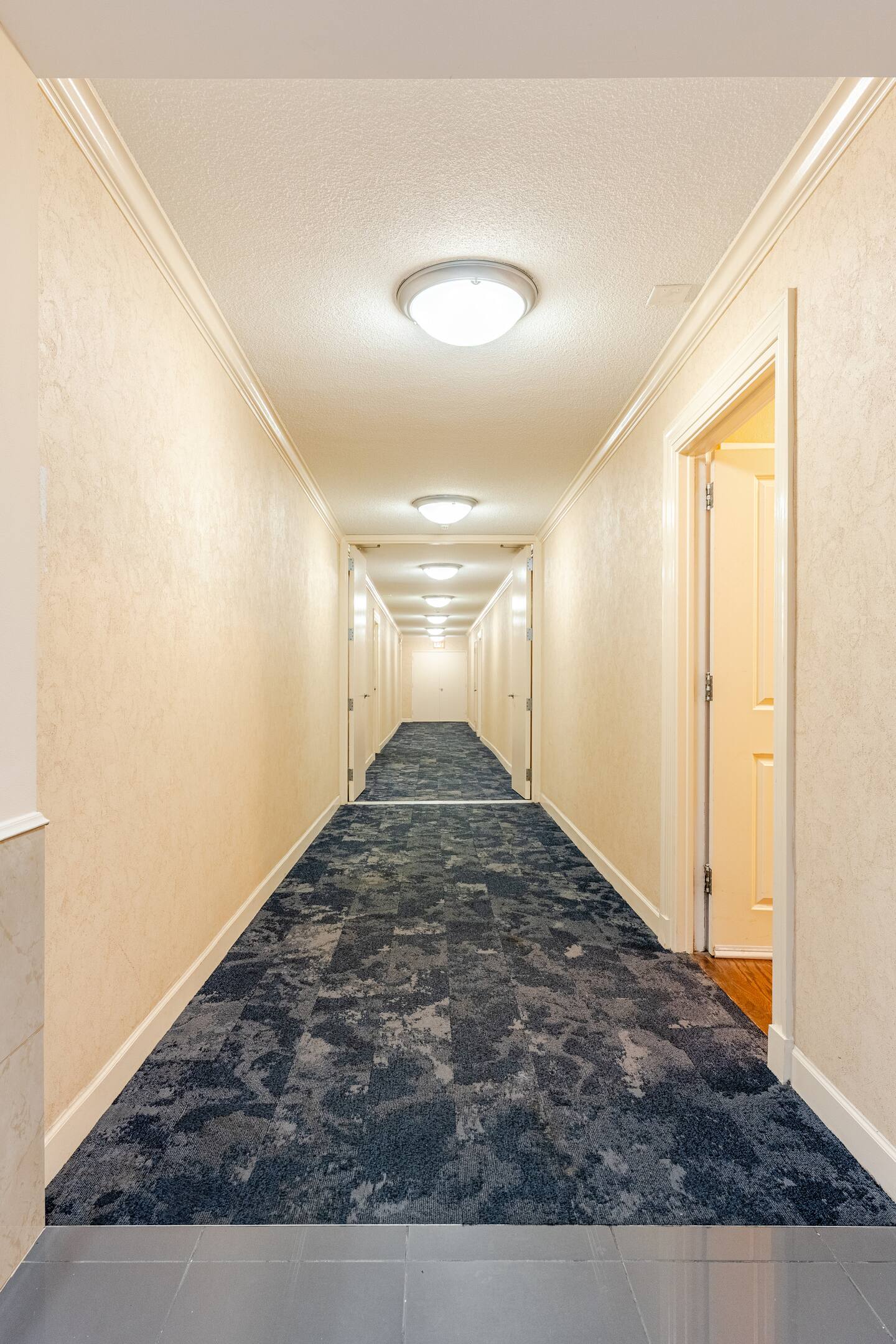 A welcoming walkway leads you directly to the condo entrance.