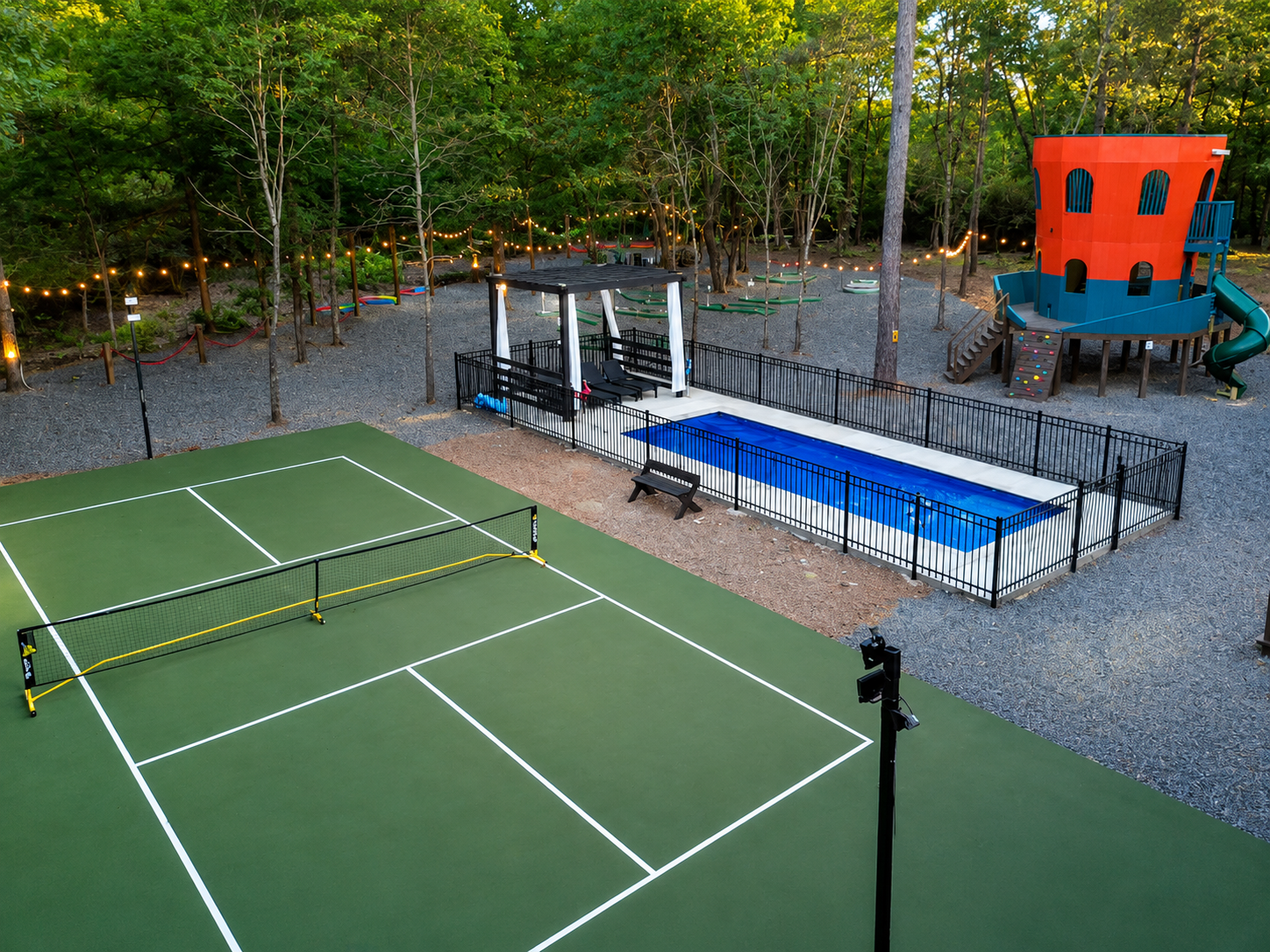 Outdoor Oasis: Enjoy tennis, swimming, and fun at your private playground in Broken Bow!