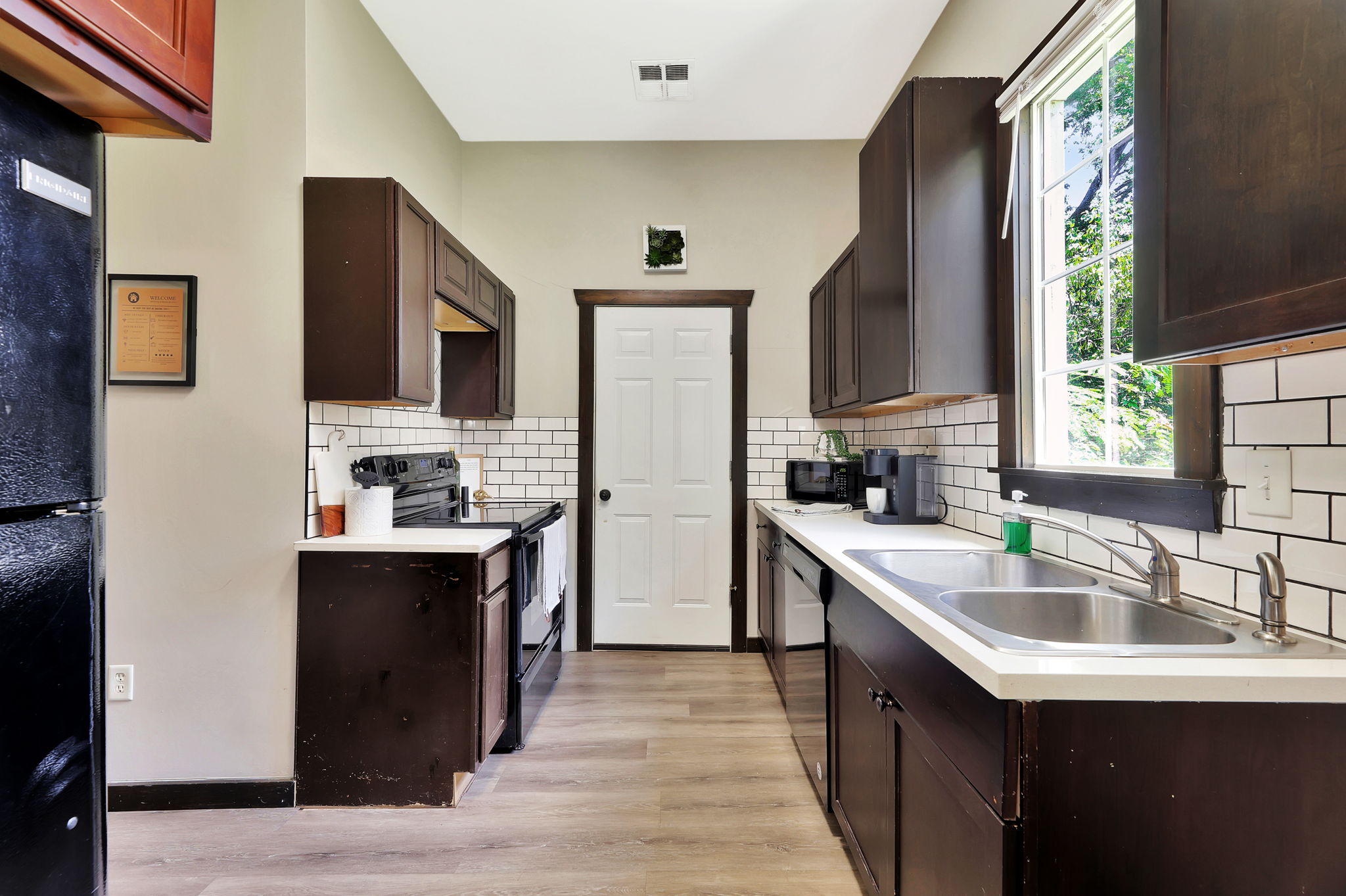 Gallery style kitchen makes for easy meal preparations.