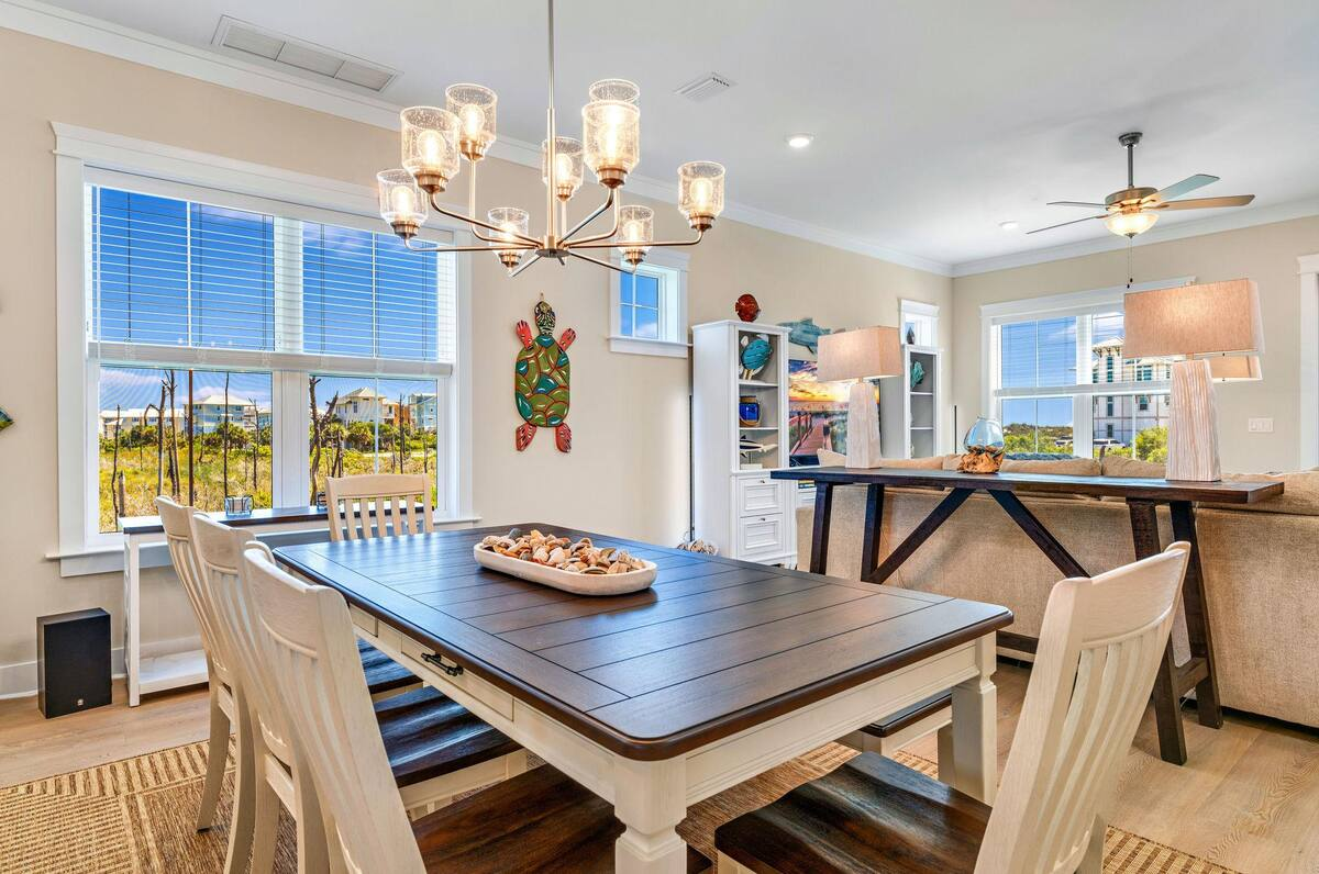 Gather around the large dining table with seating for 8+, ideal for family meals, game nights, and unforgettable conversations.