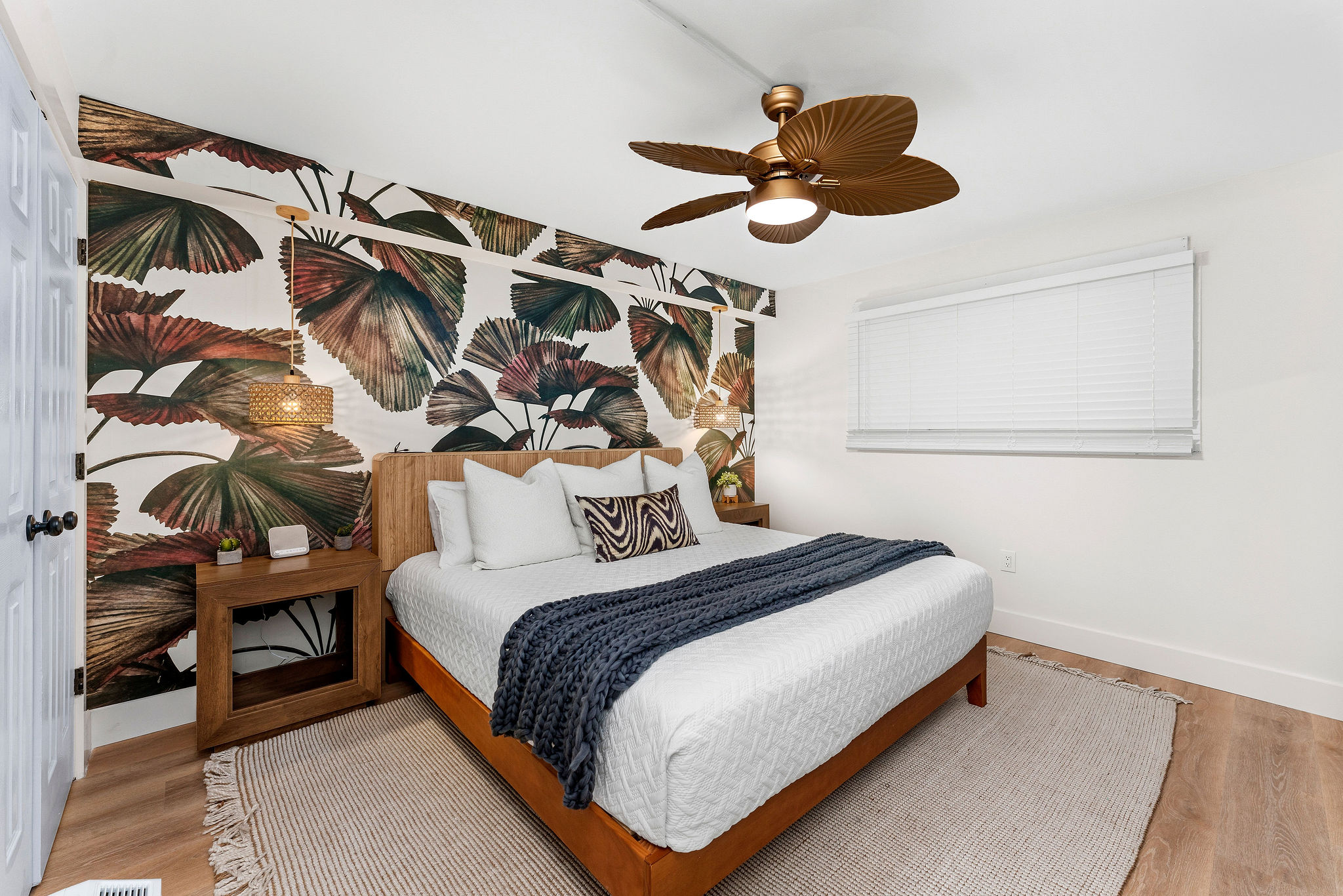Guest King bedroom features a brand new bed and furnishings. Snuggle up under the thick woven throw blanket. The premium bed pillows provide excellent support for your neck.