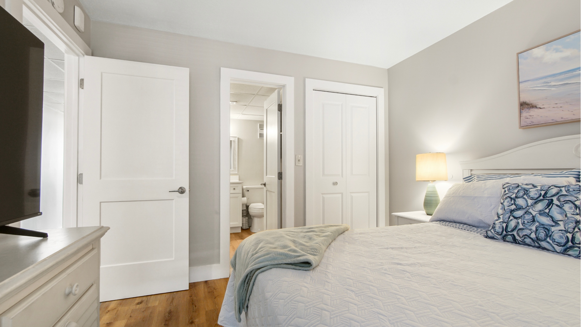 Second bedroom with queen bed, and bathroom access