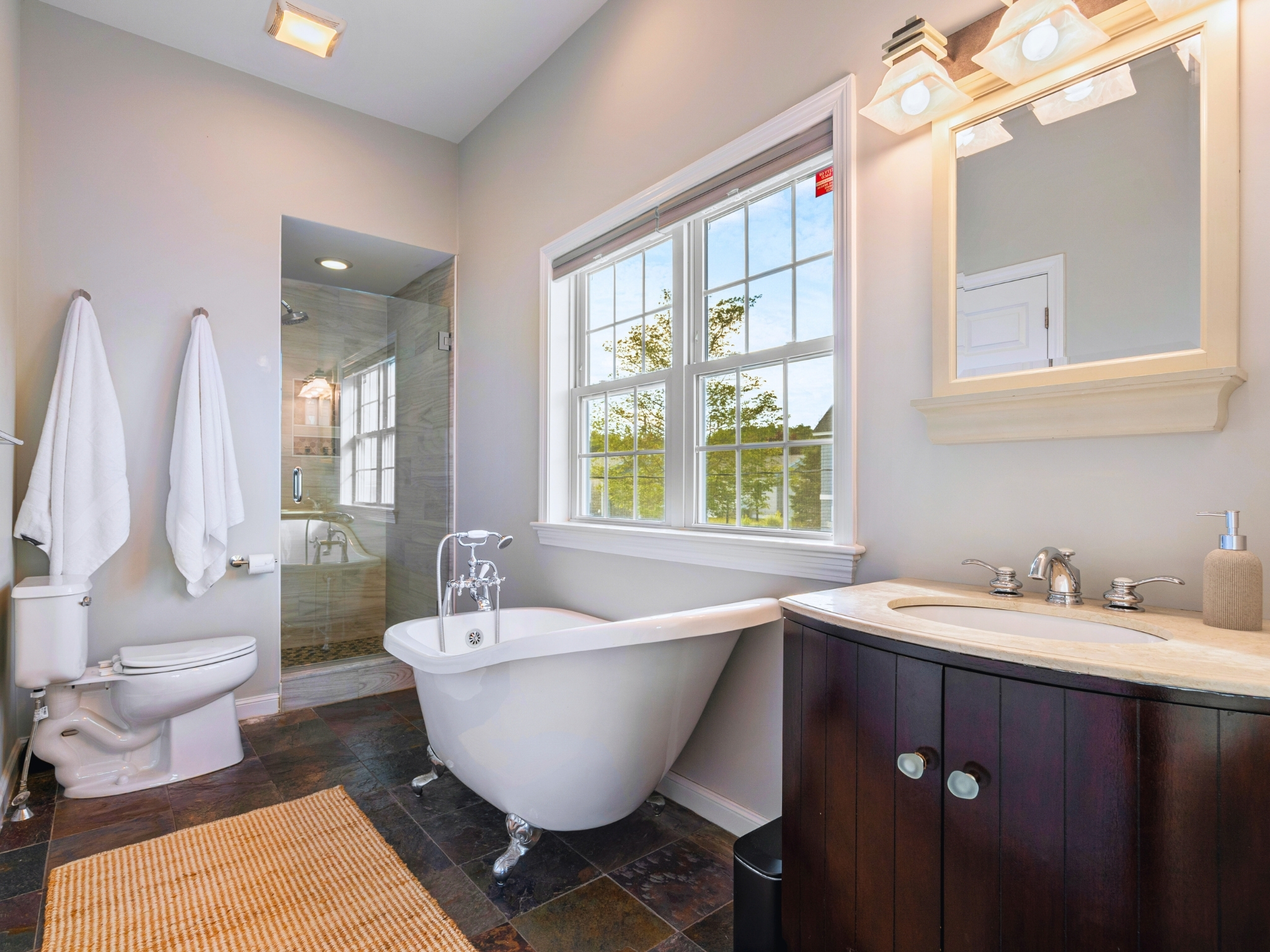 A serene oasis, where the ensuite bathroom offers the perfect place to unwind after a long day!