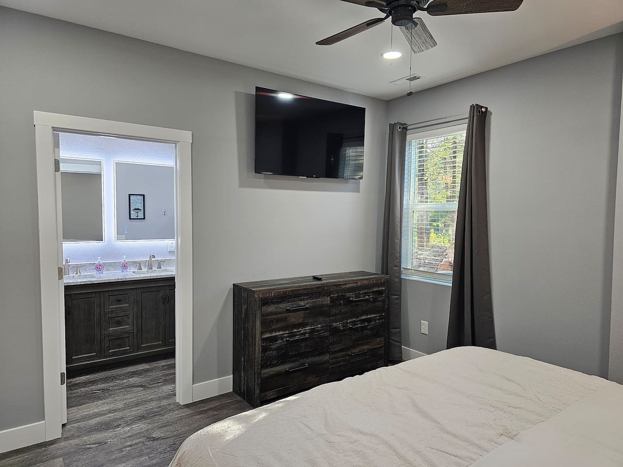 Clean, modern King suite with smart TV.