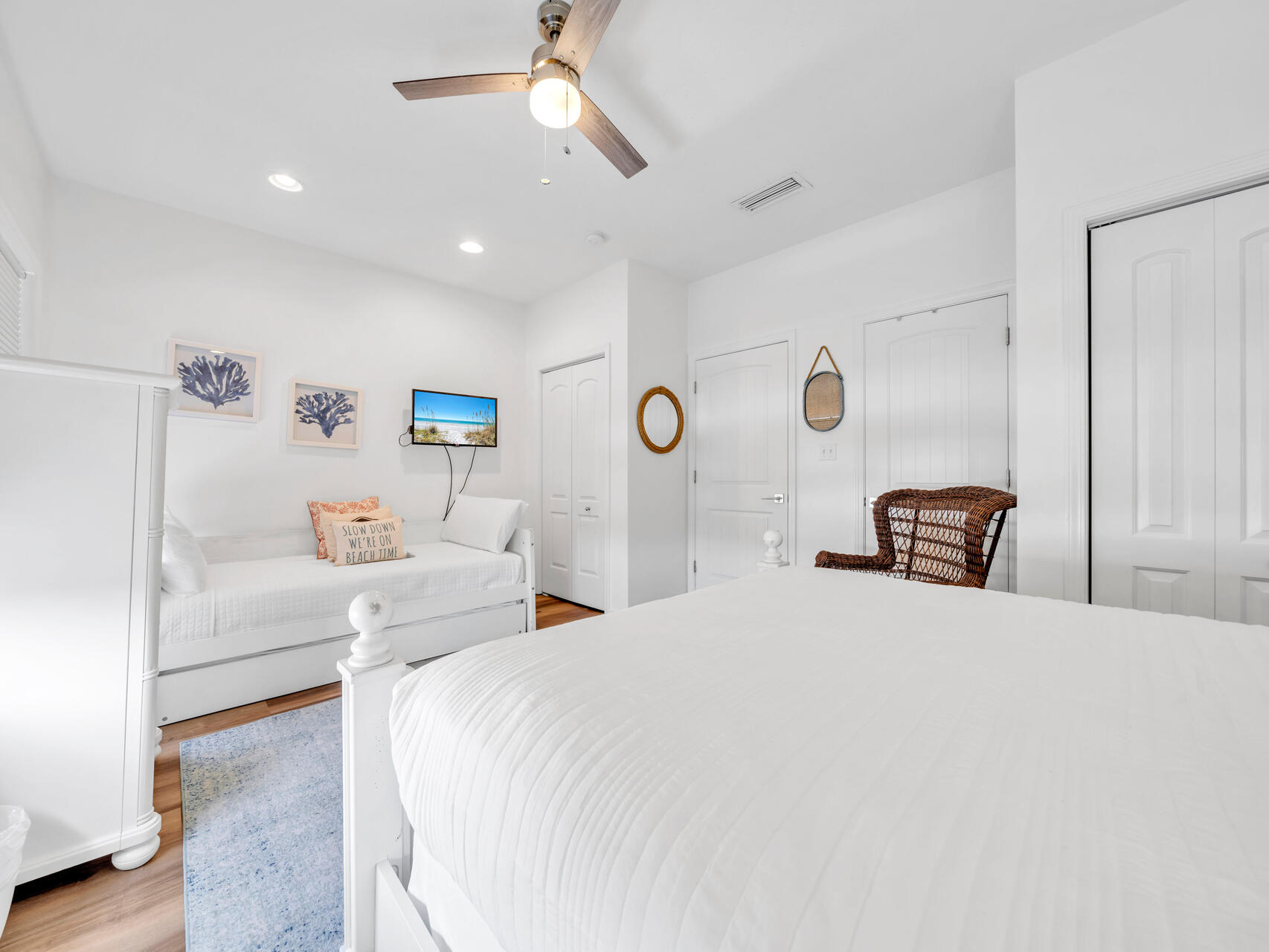Another view of the second-floor bedroom (queen/twin/twin).  Like all rooms, this room has its own television.