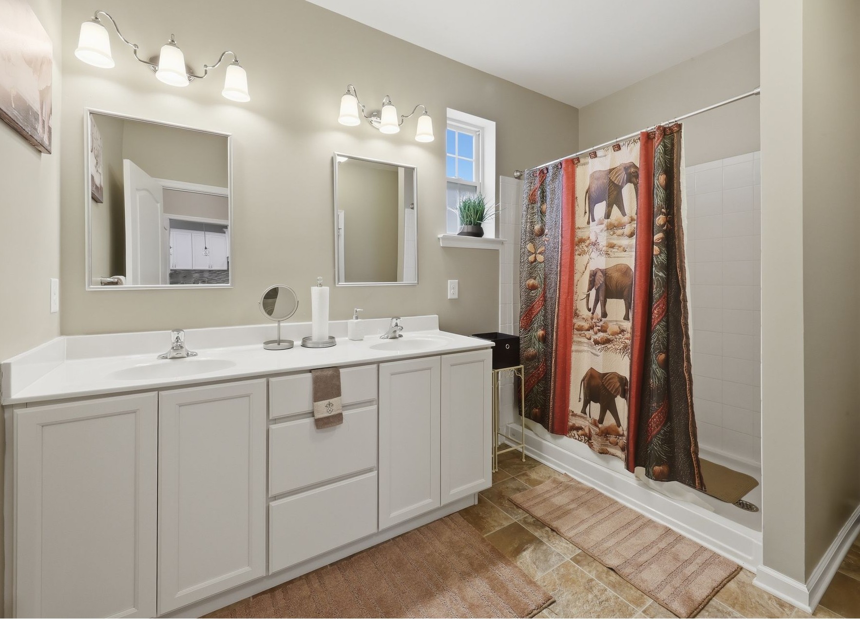 Double vanity with storage below and extra toiletries