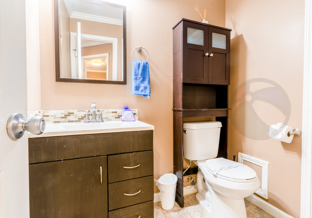 Half bath accessed through the master bedroom