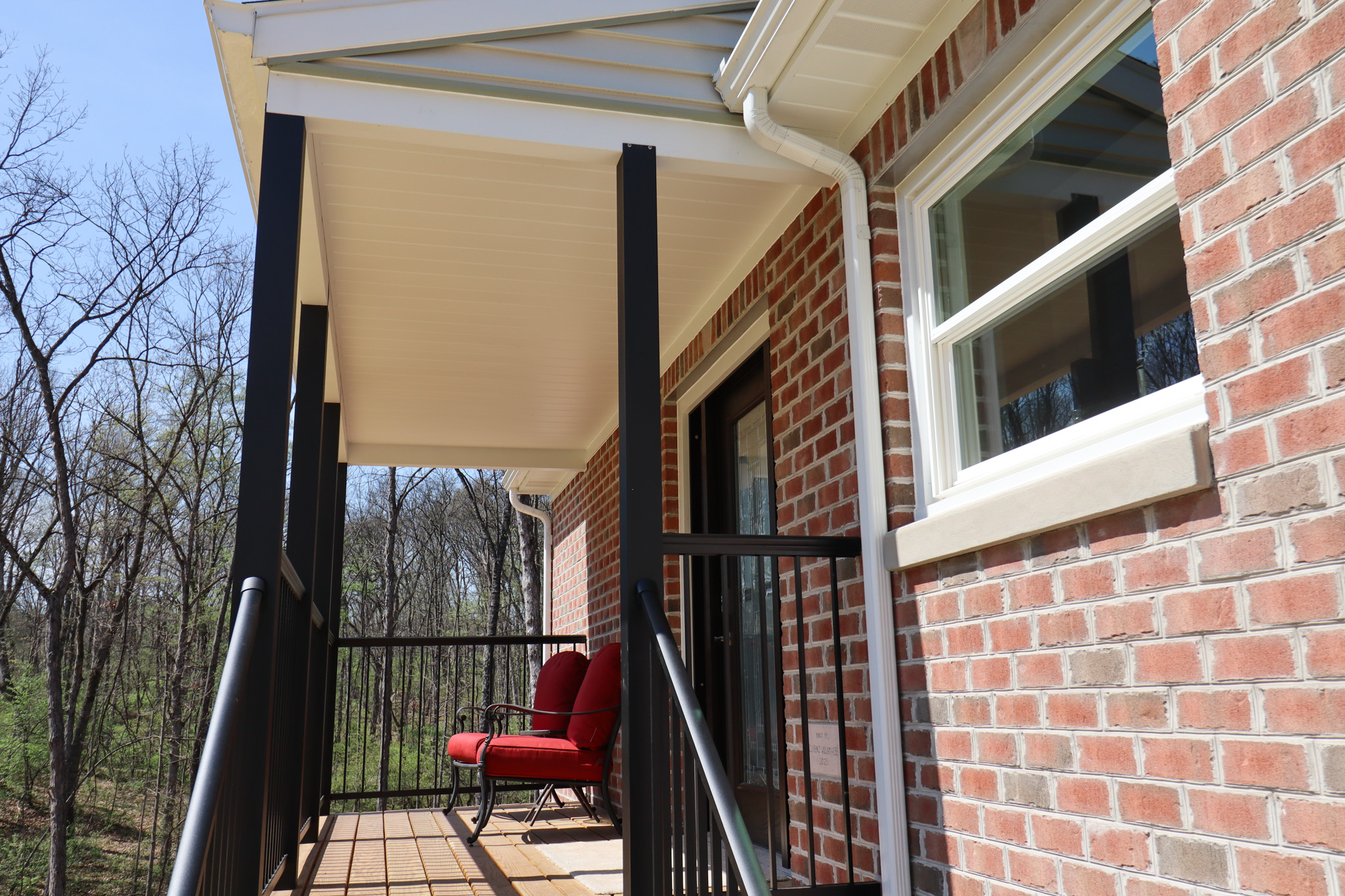 A few steps up to the porch where entrance is