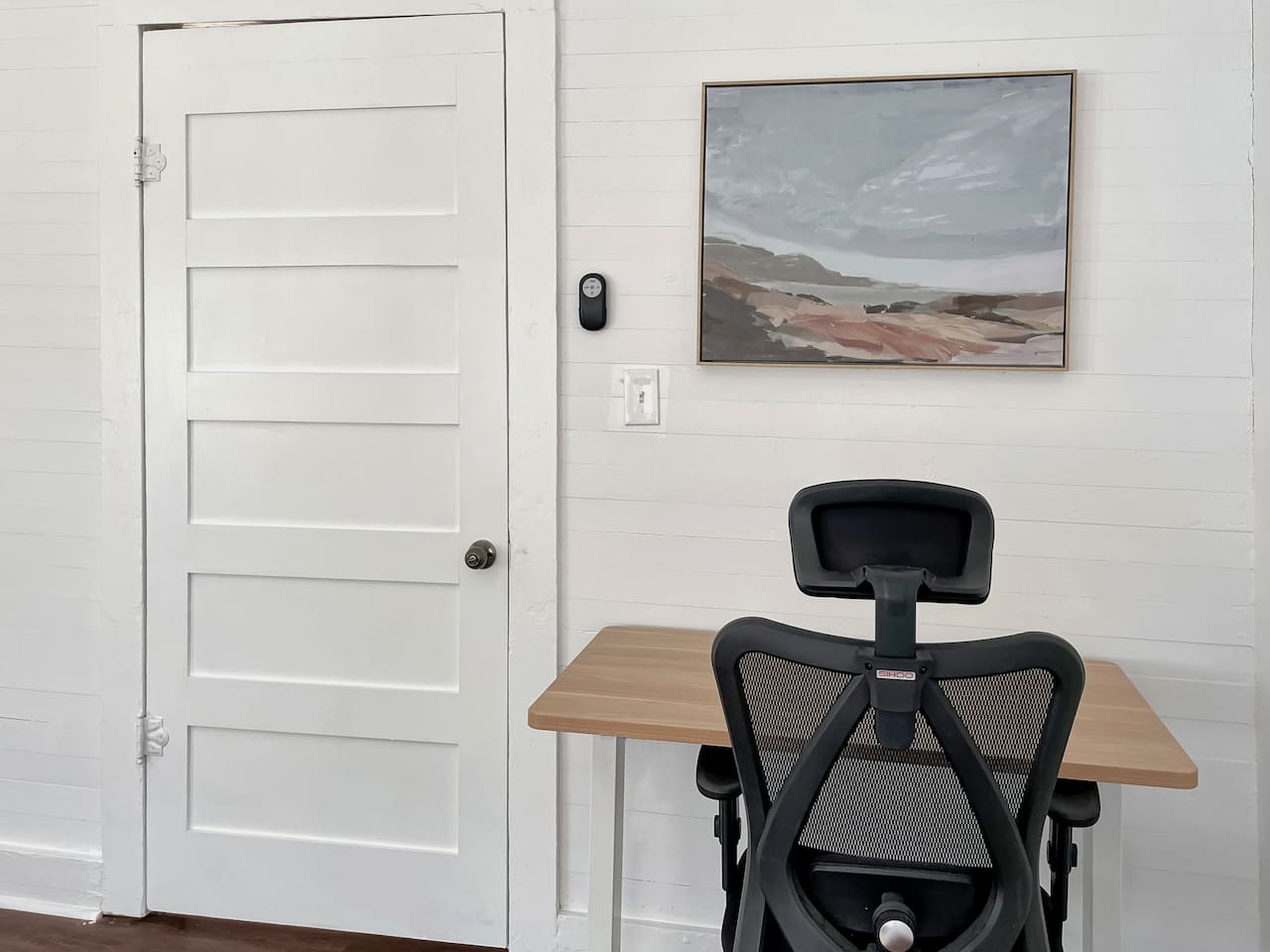 The large desk and ergonomic chair will help you stay focused.