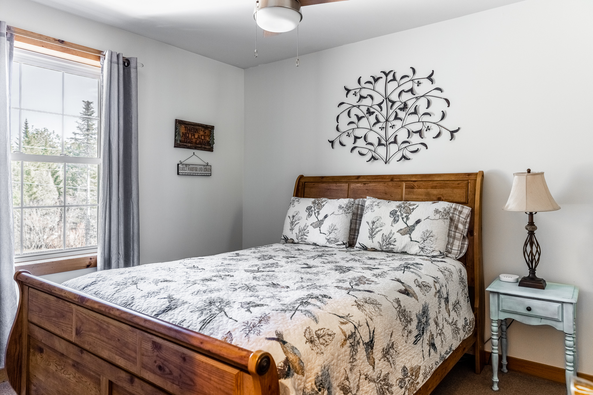 Upstairs bedroom with a queen bed.