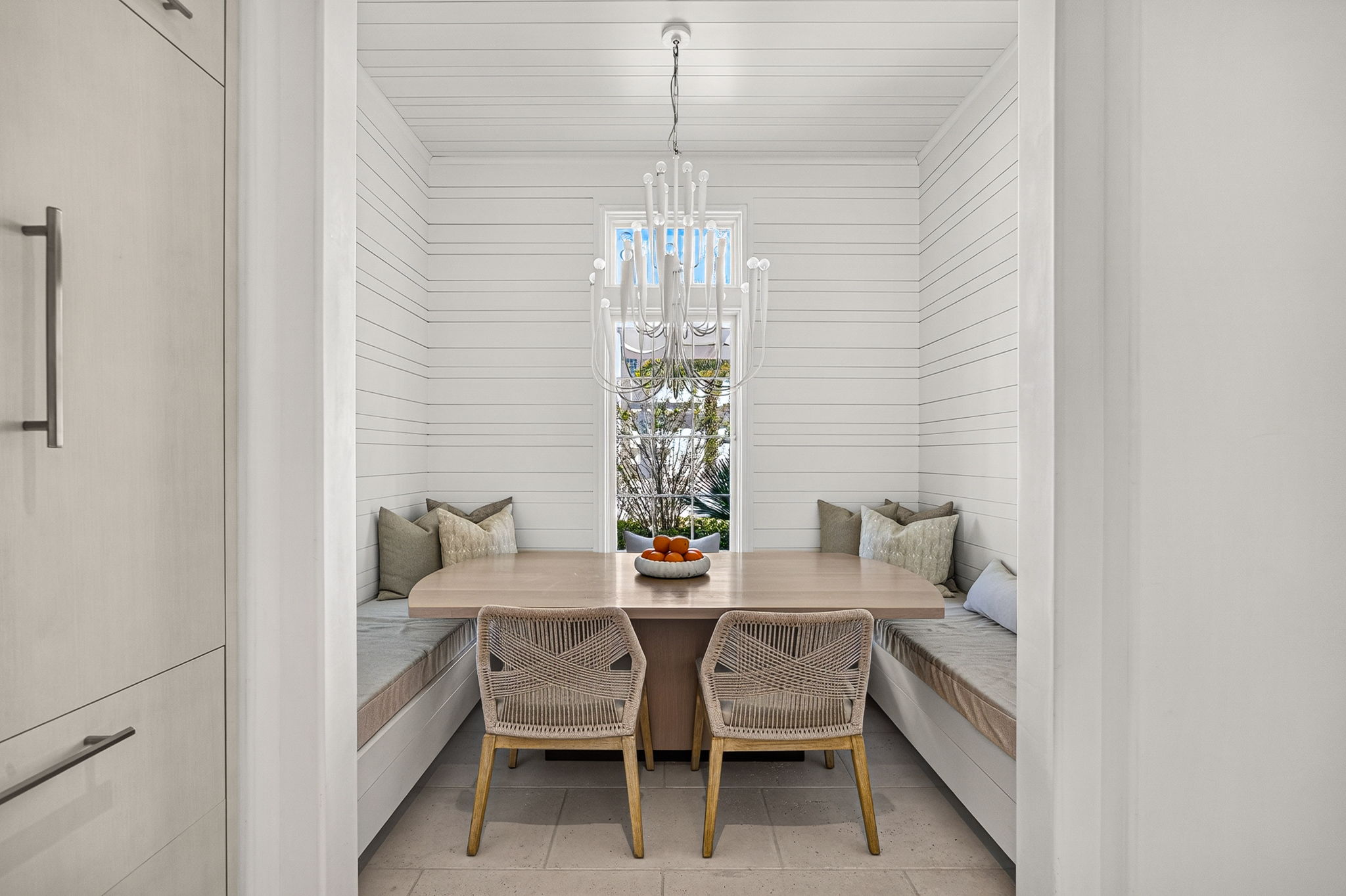 The built-in dining area offers comfortable seating for family meals.