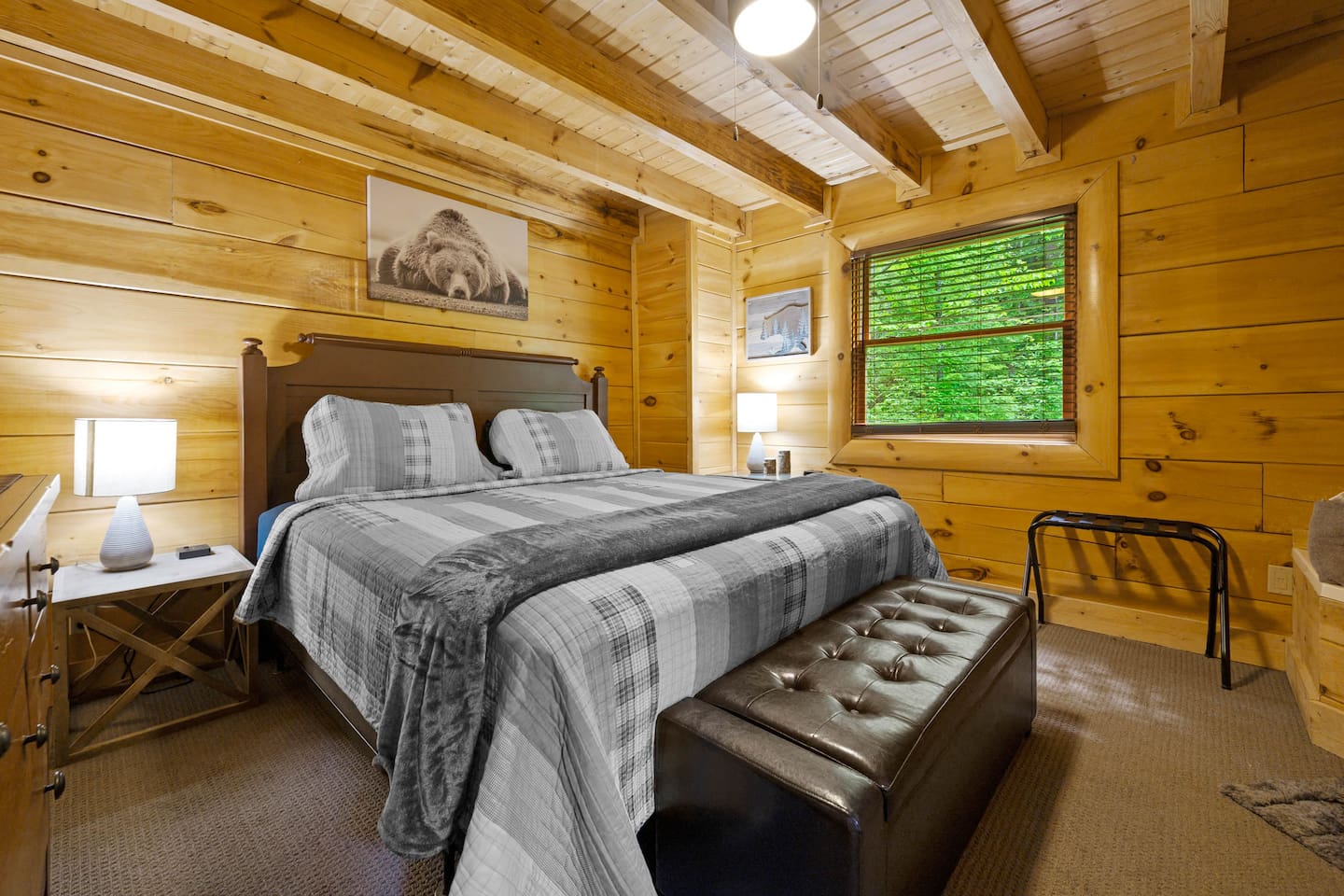 King bed in the back bedroom.  Bedroom includes an en-suite bathroom.