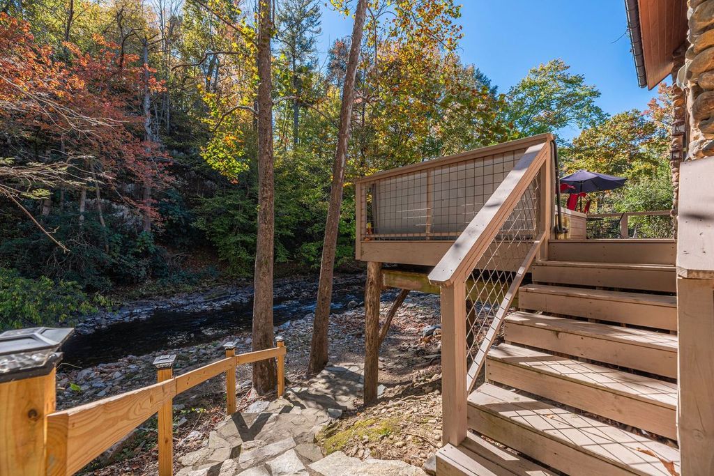 There are steps off of the cottage deck that lead to the creek below. 