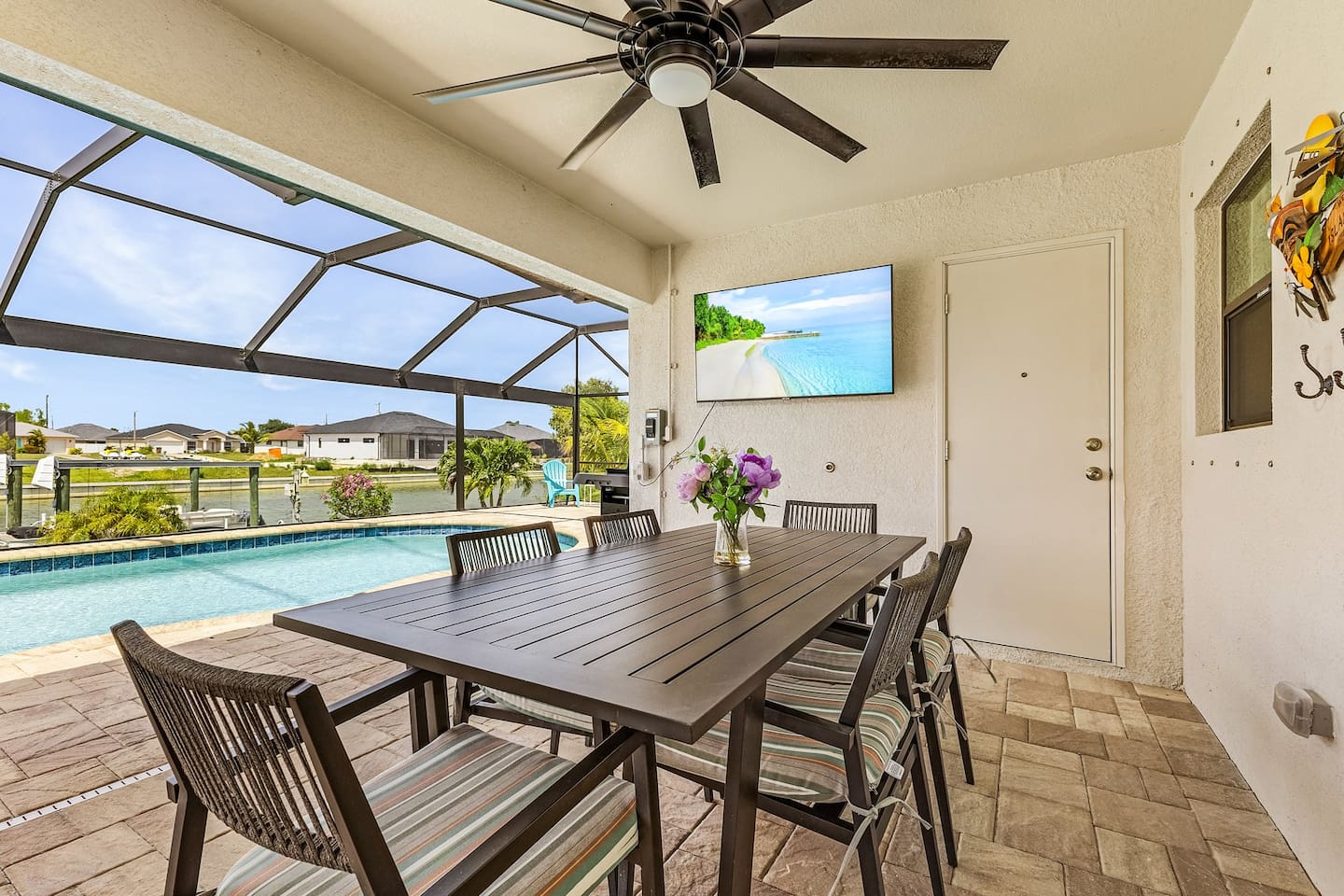 Enjoy picturesque outdoor dining with stunning views of the water and pool!