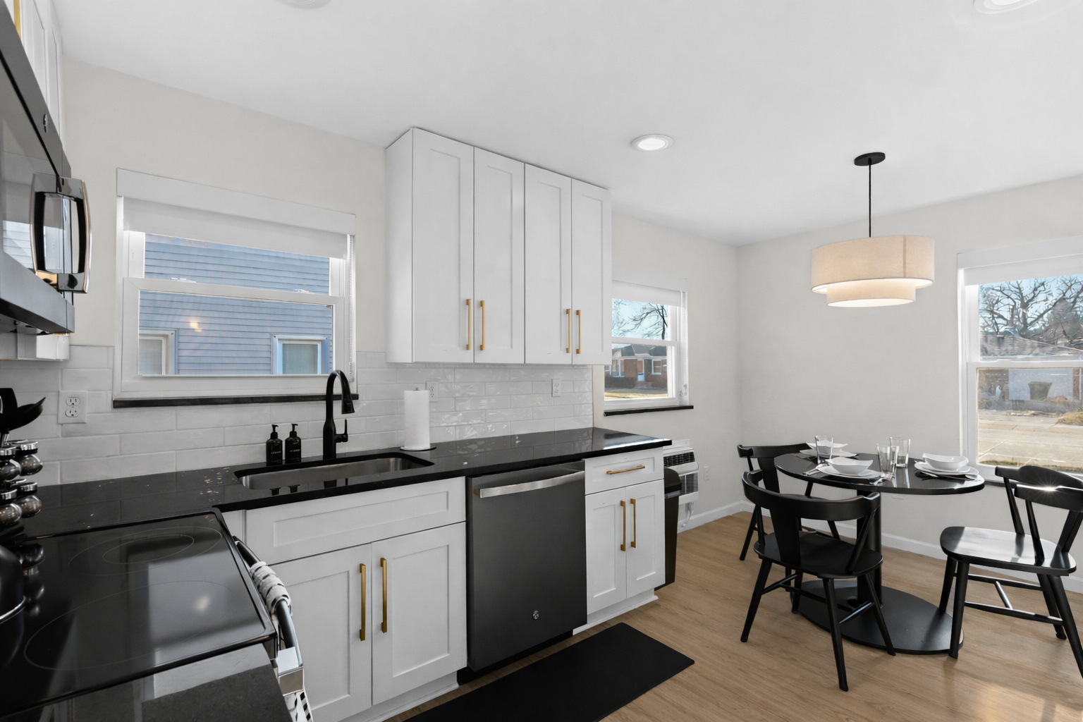 Bright, open kitchen and dining area with modern appliances, sleek finishes, and plenty of natural light—perfect for cooking, dining, and entertaining.