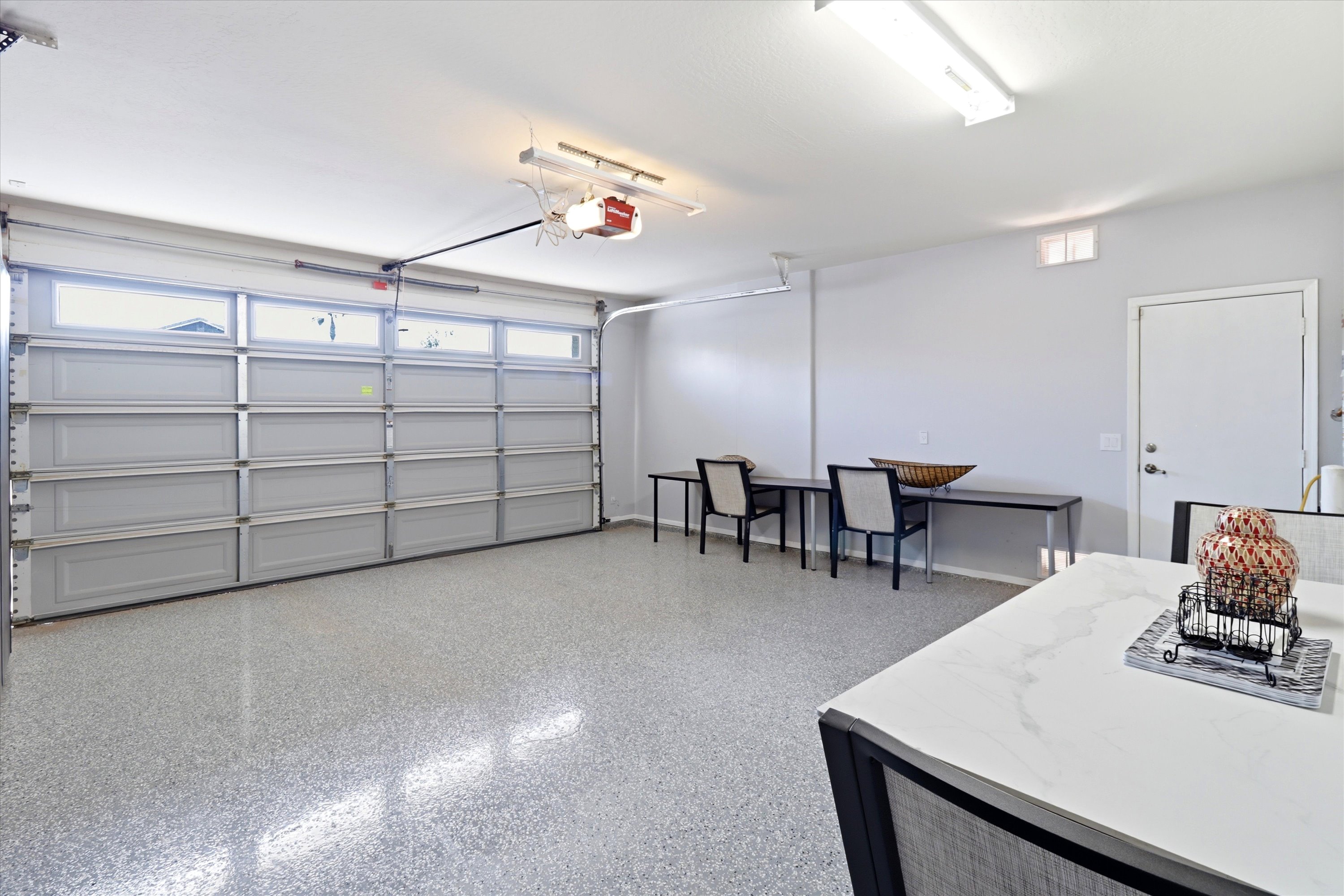 Garage space with table seating, extra room to spread out, and direct access into the home.
