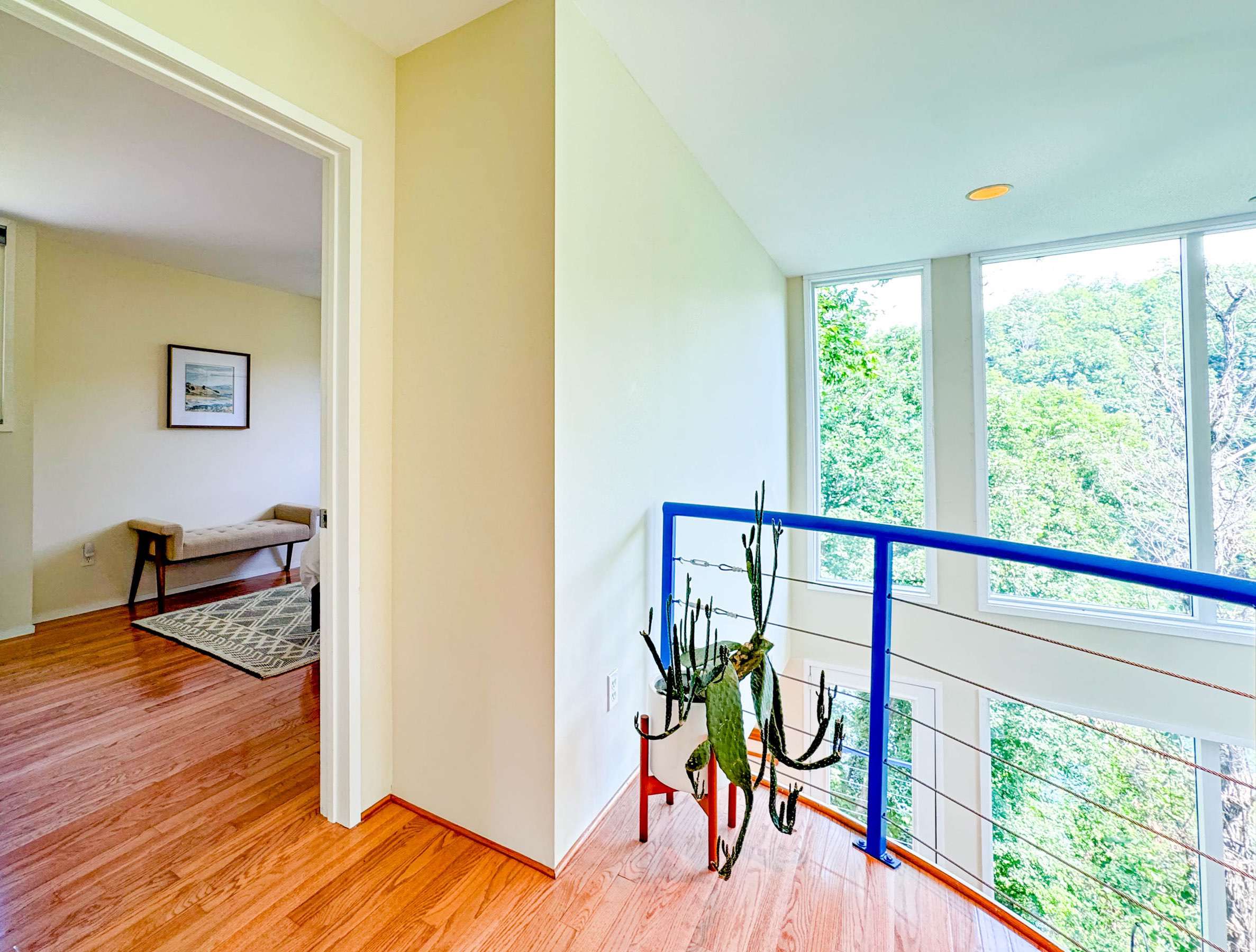 Upstairs bedroom 2 just to the left of the upstairs balcony