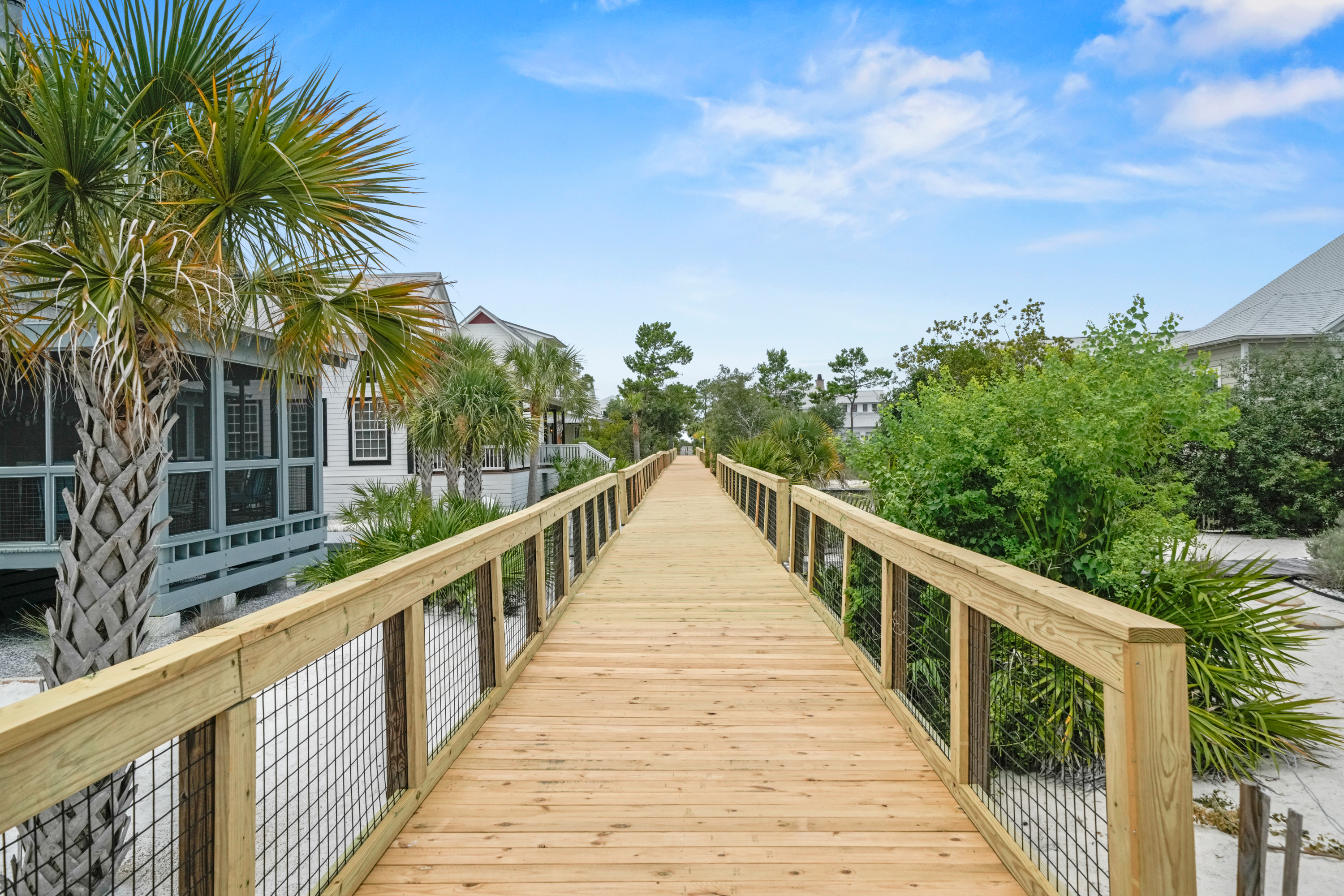 Follow the scenic private boardwalk and enjoy easy access to the sugar-white sand and emerald waters