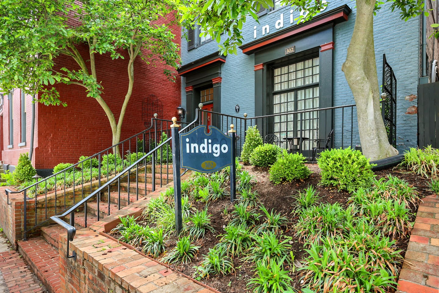 Watch the city walk by from our front brick patio