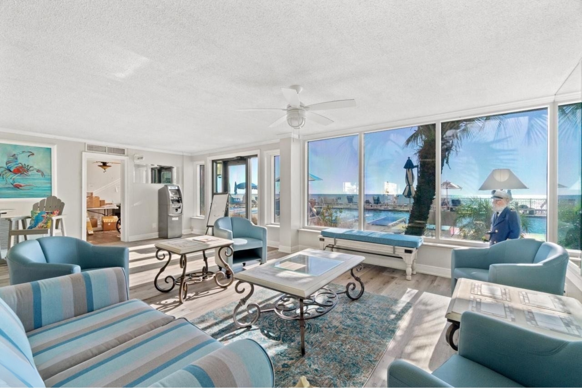 Common area/social room overlooking the pools and Gulf
