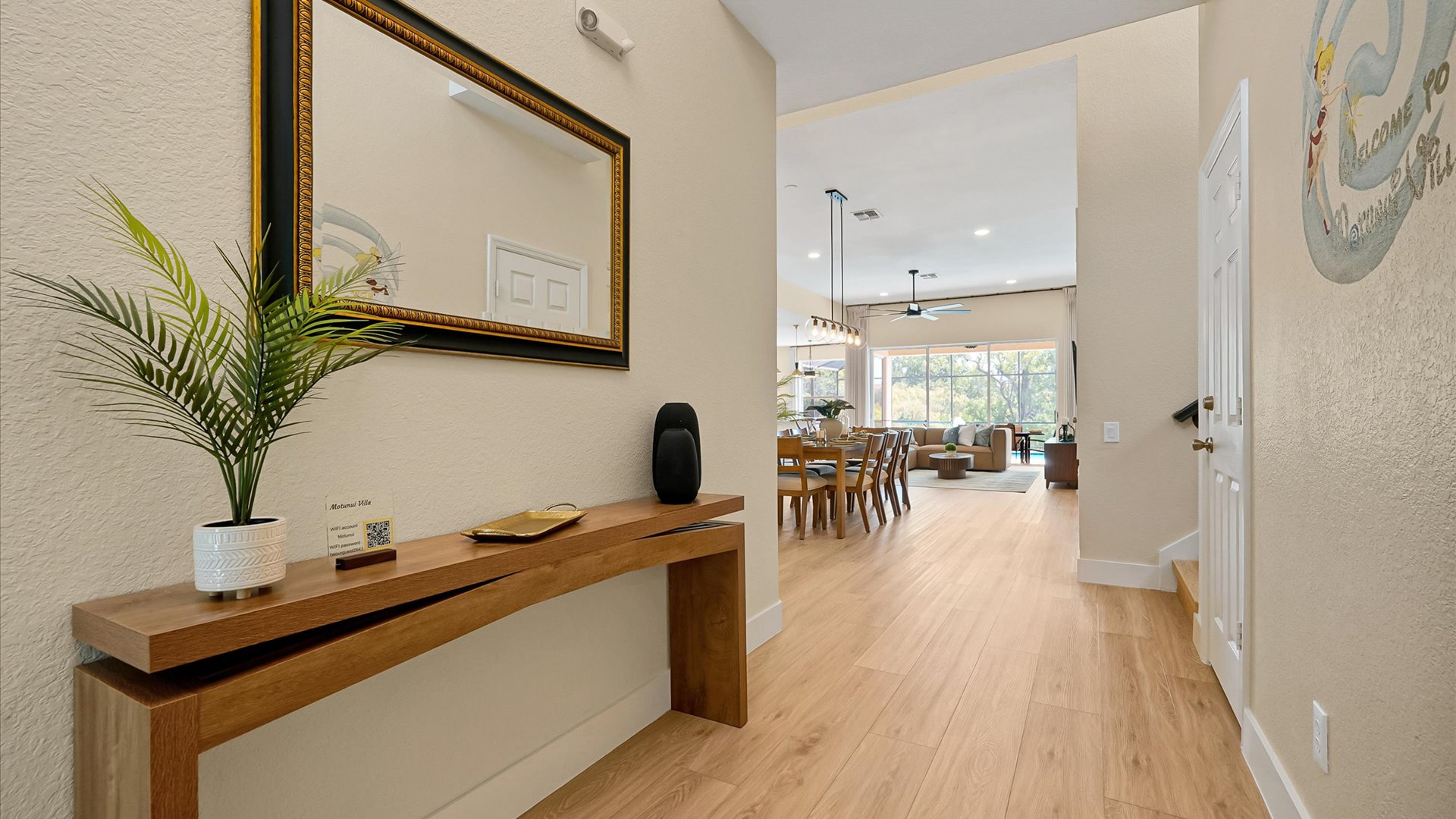 Foyer: Bright foyer leading into the spacious open-concept dining and living areas.